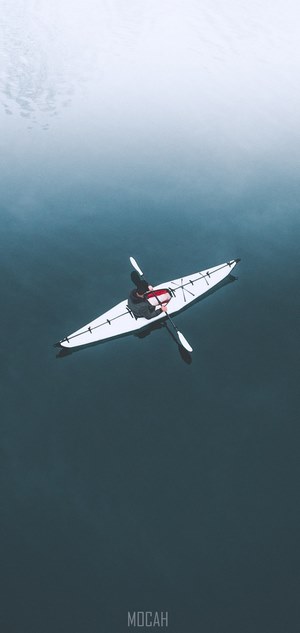 Drone Shot Of A Lone Kayaker In The Water Early Morning Adventure