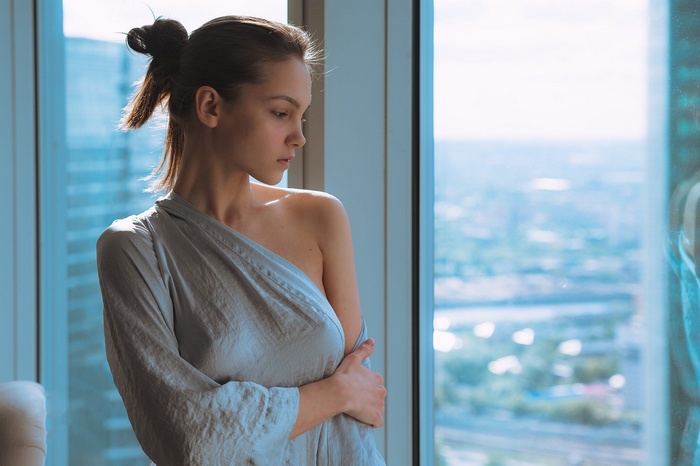 Women No Bra Brunette Profile Looking Into The Distance Window