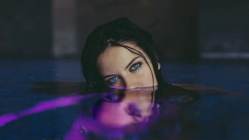 Charming Brunette with Blue Eyes in Water, Reflection Live Wallpaper