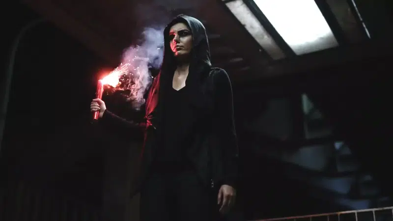 a girl with a fire in her hand, girl with hand flare, girls Live Wallpaper