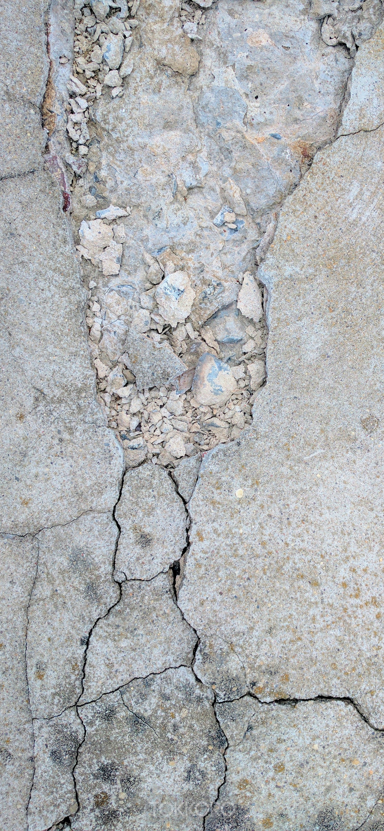 Cracked concrete texture with rubble HD Phone Wallpaper