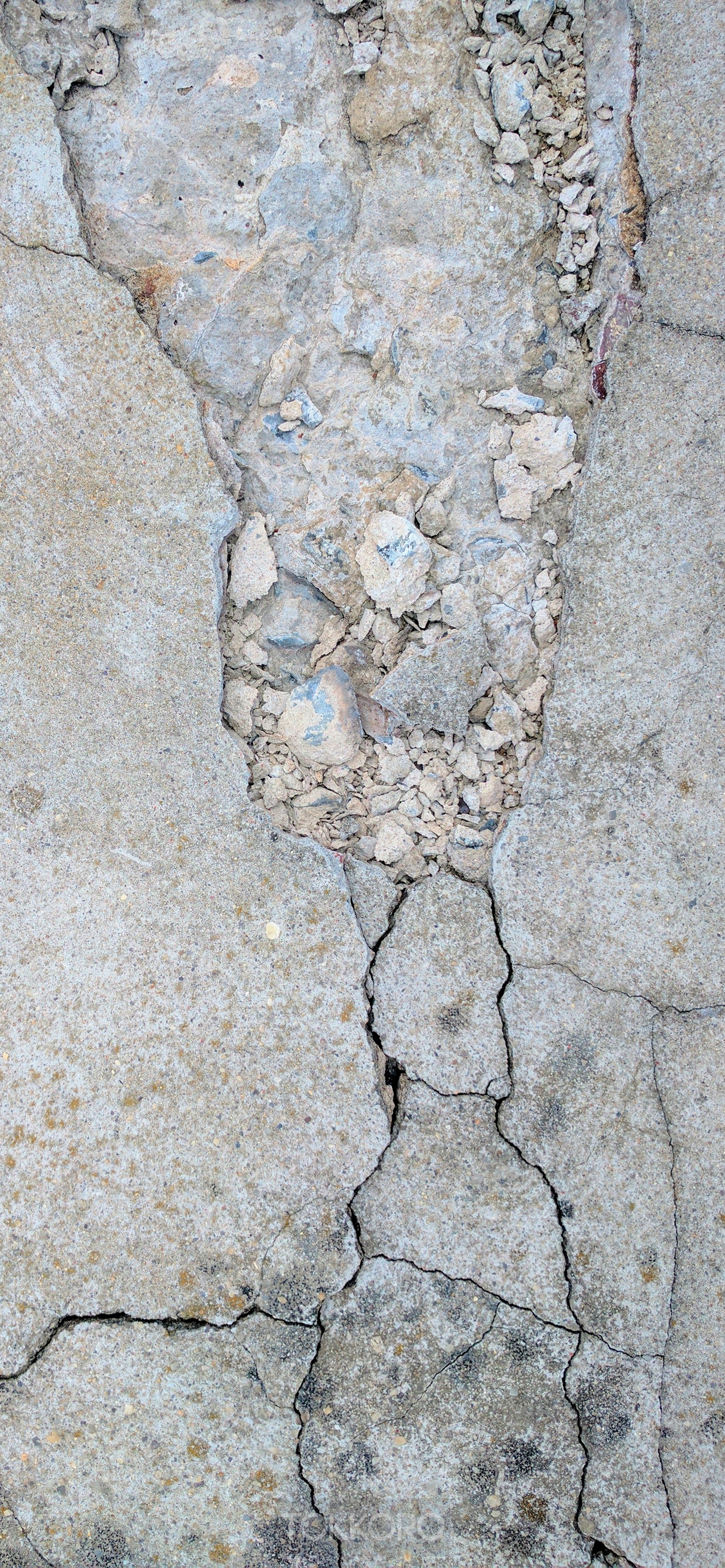 Cracked concrete texture with rubble HD Phone Wallpaper
