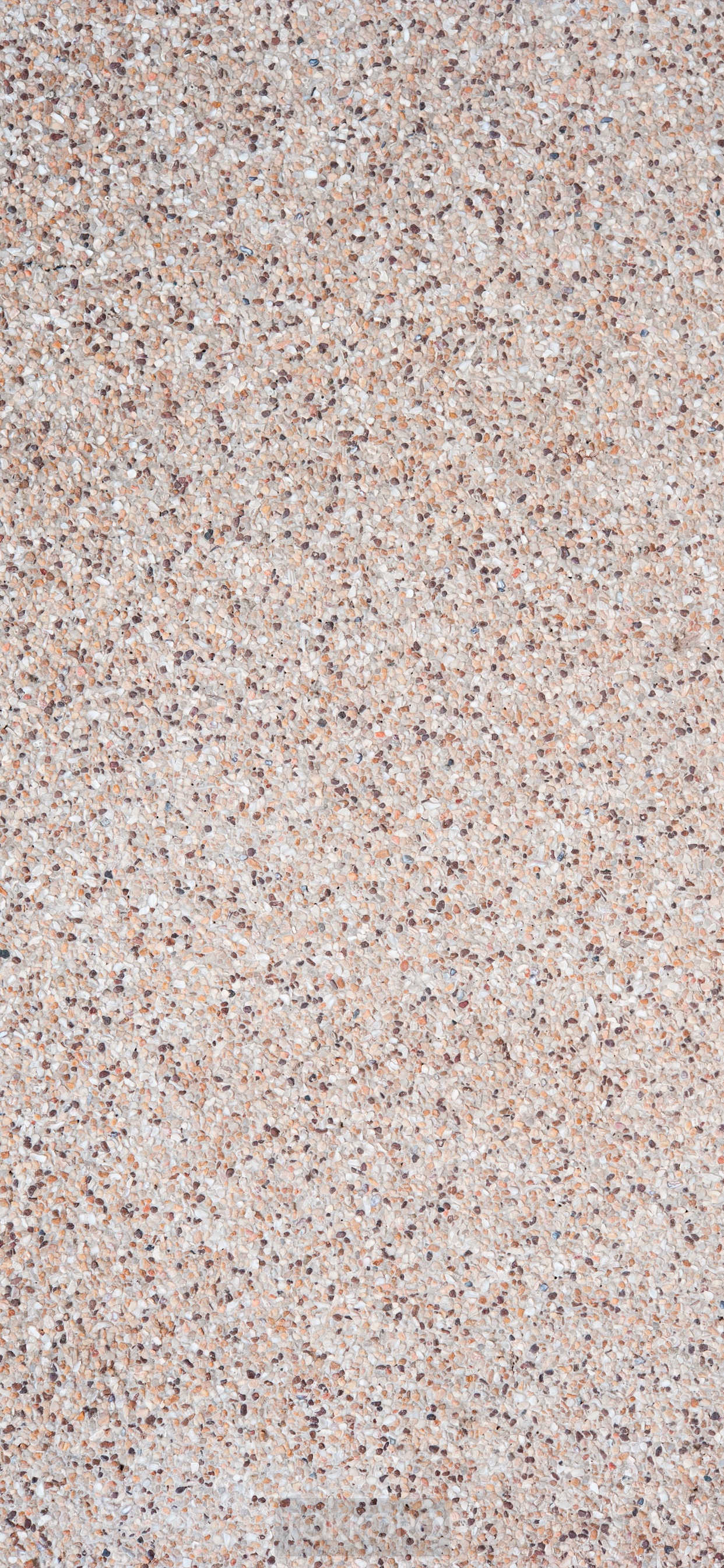 Textured surface with small pebbles HD Phone Wallpaper