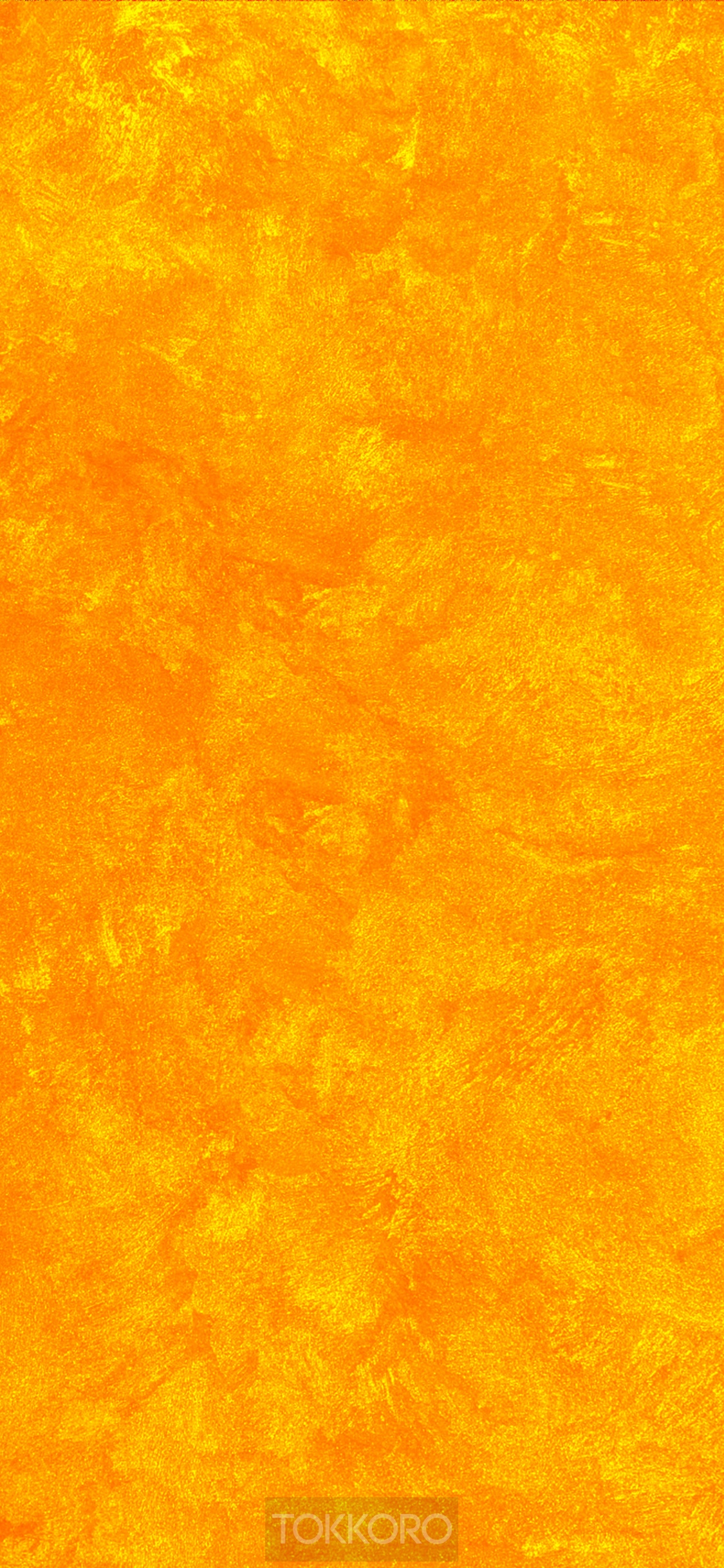 Yellow textured surface with "TOKOKORO" watermark HD Phone Wallpaper