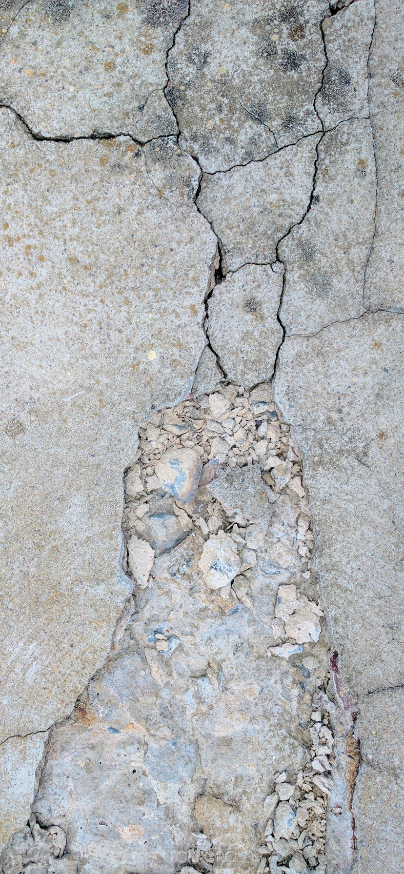 Cracked concrete texture with broken pieces HD Phone Wallpaper
