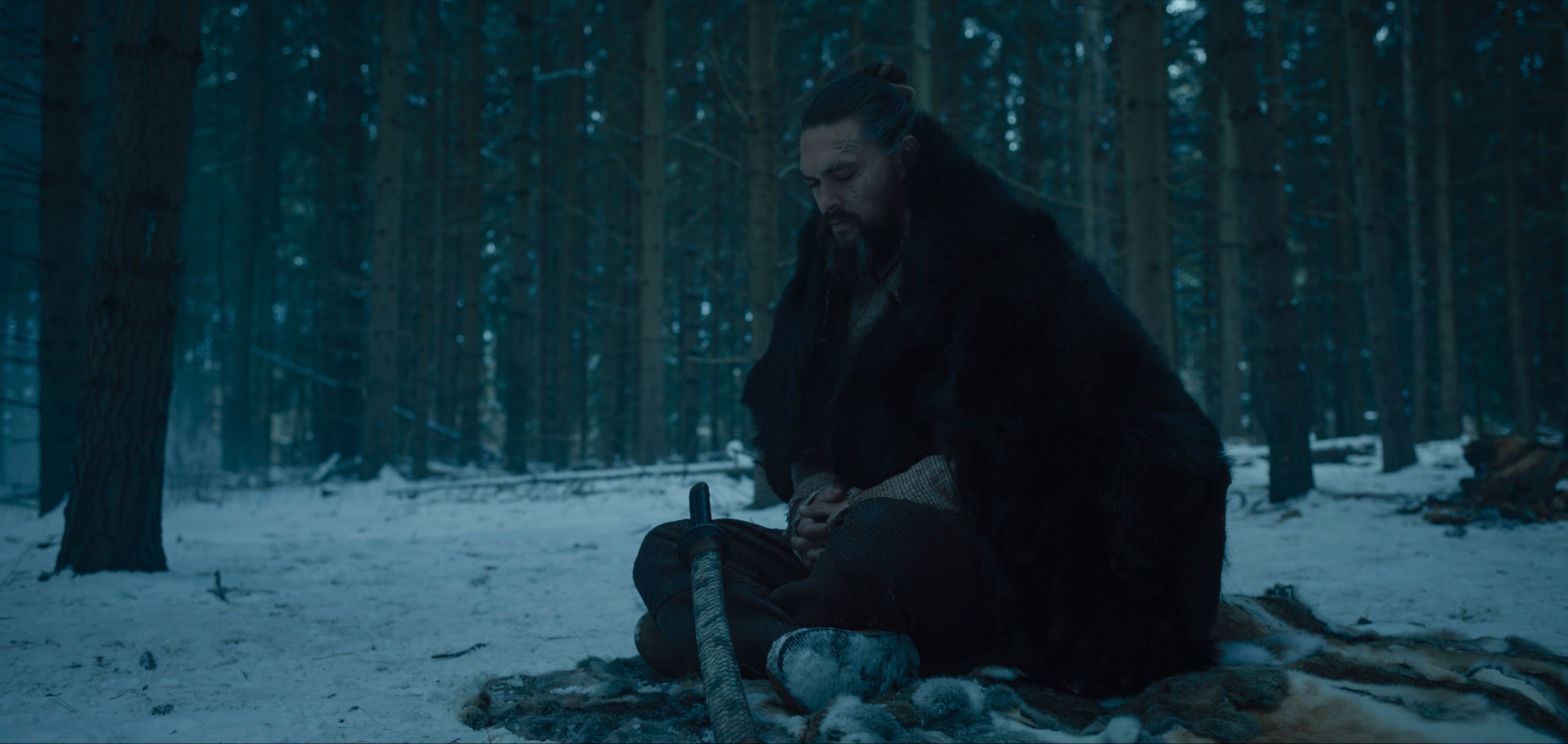 Jason Momoa in a snowy forest HD Wallpaper