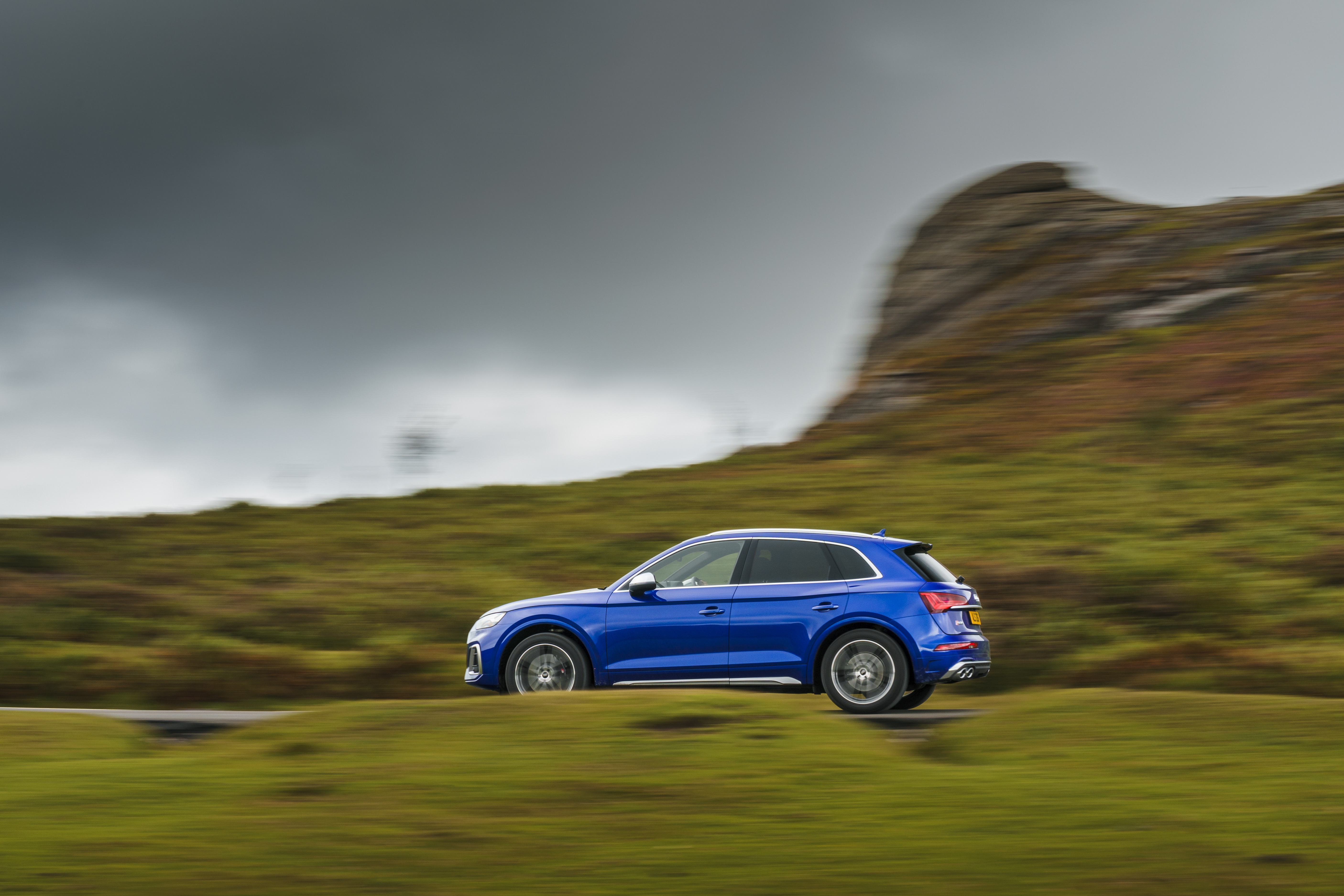 Blue Audi SQ5 TDI 4K SUV driving on a road HD Wallpaper