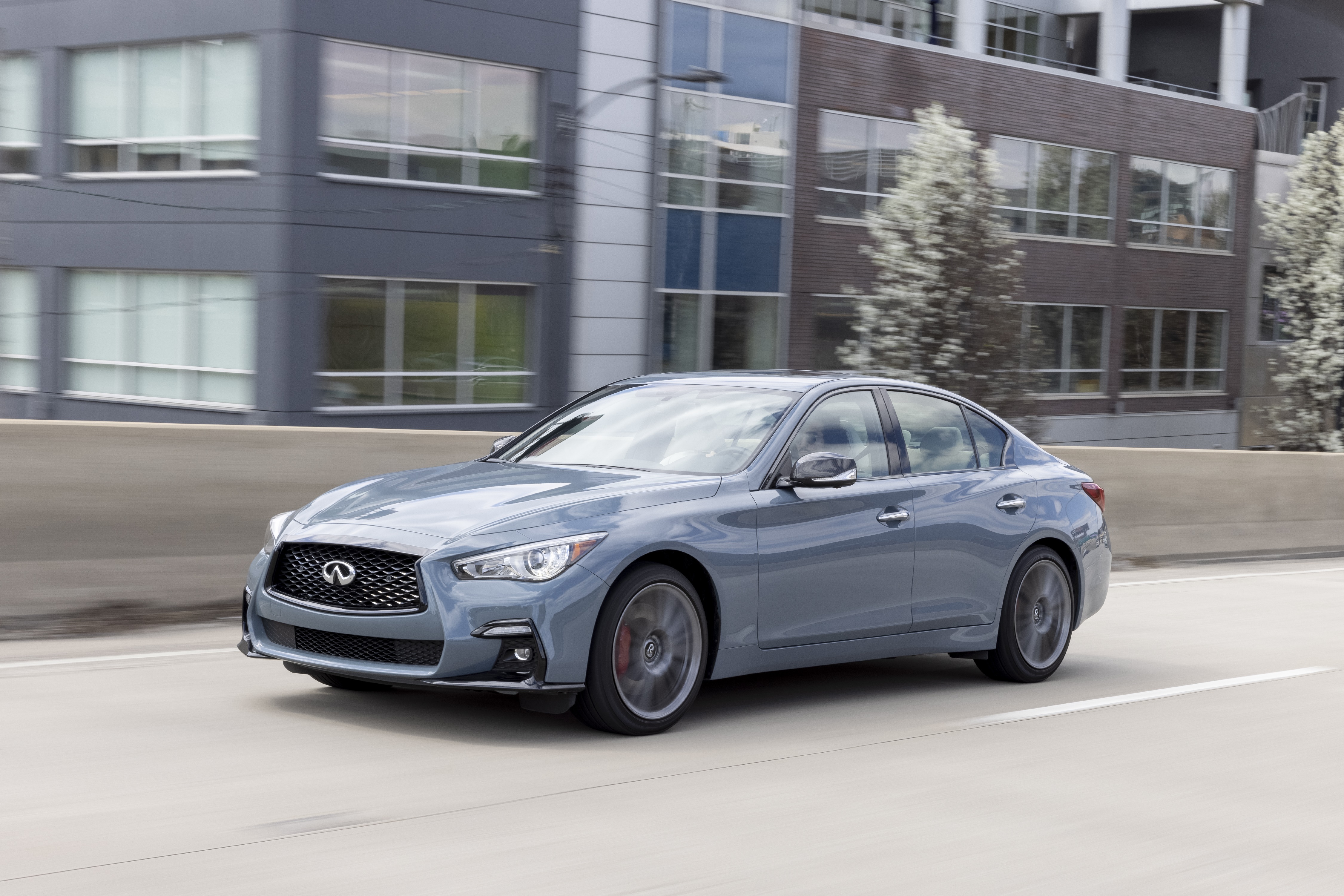 2022 Infiniti Q50S Sensory driving on a highway HD Wallpaper