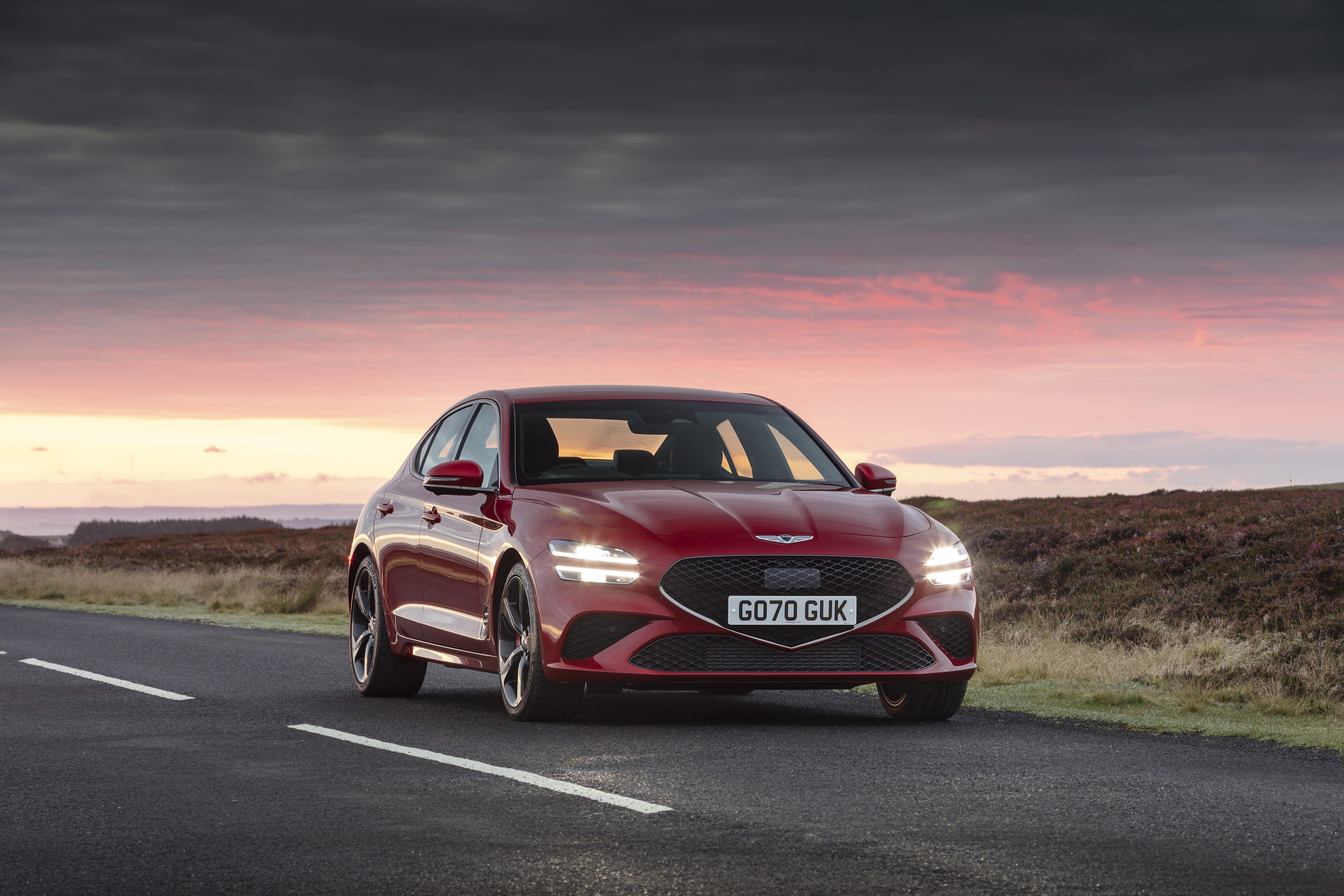 Red Genesis G70 2.0T on a road at sunset HD Wallpaper