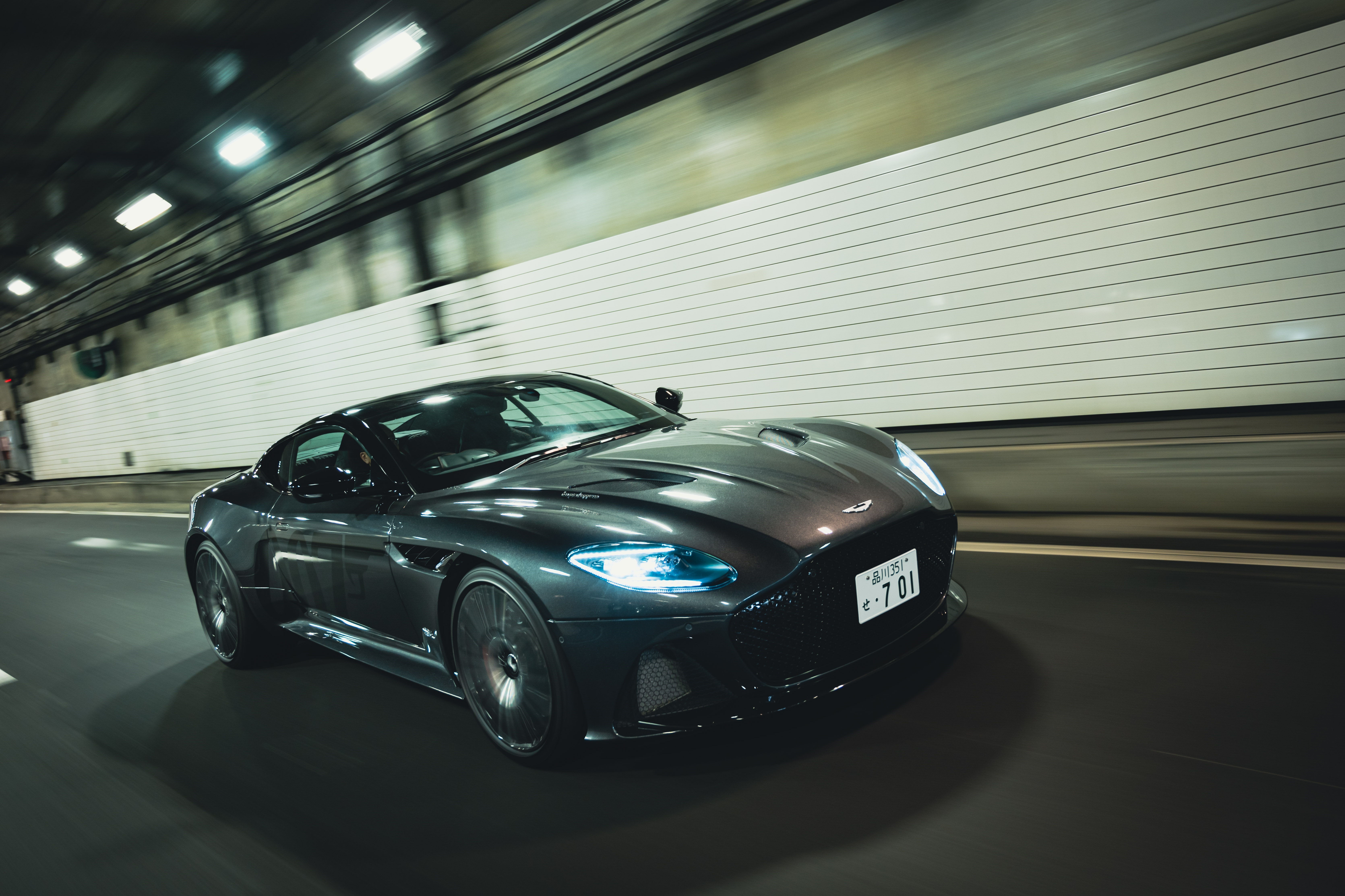 Aston Martin DBS Superleggera driving in tunnel HD Wallpaper