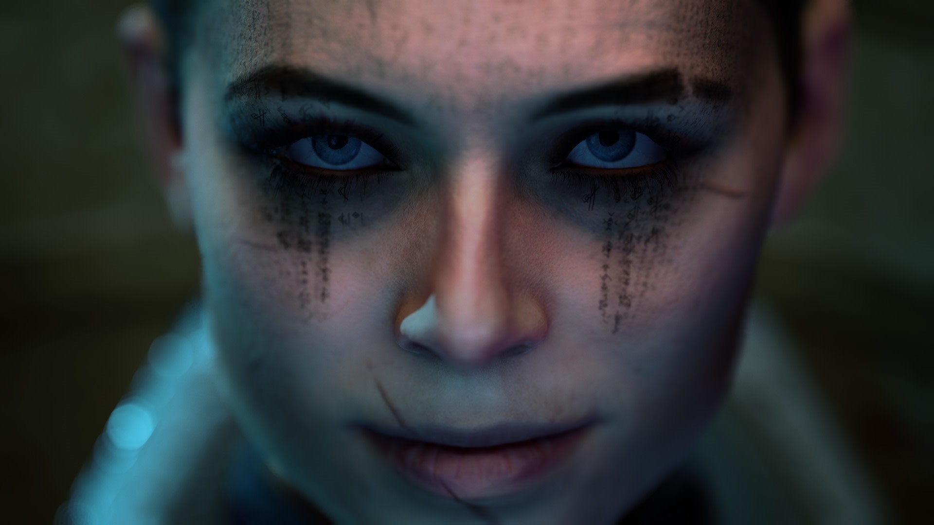 Close-up of a woman's face with blue eyes HD Wallpaper