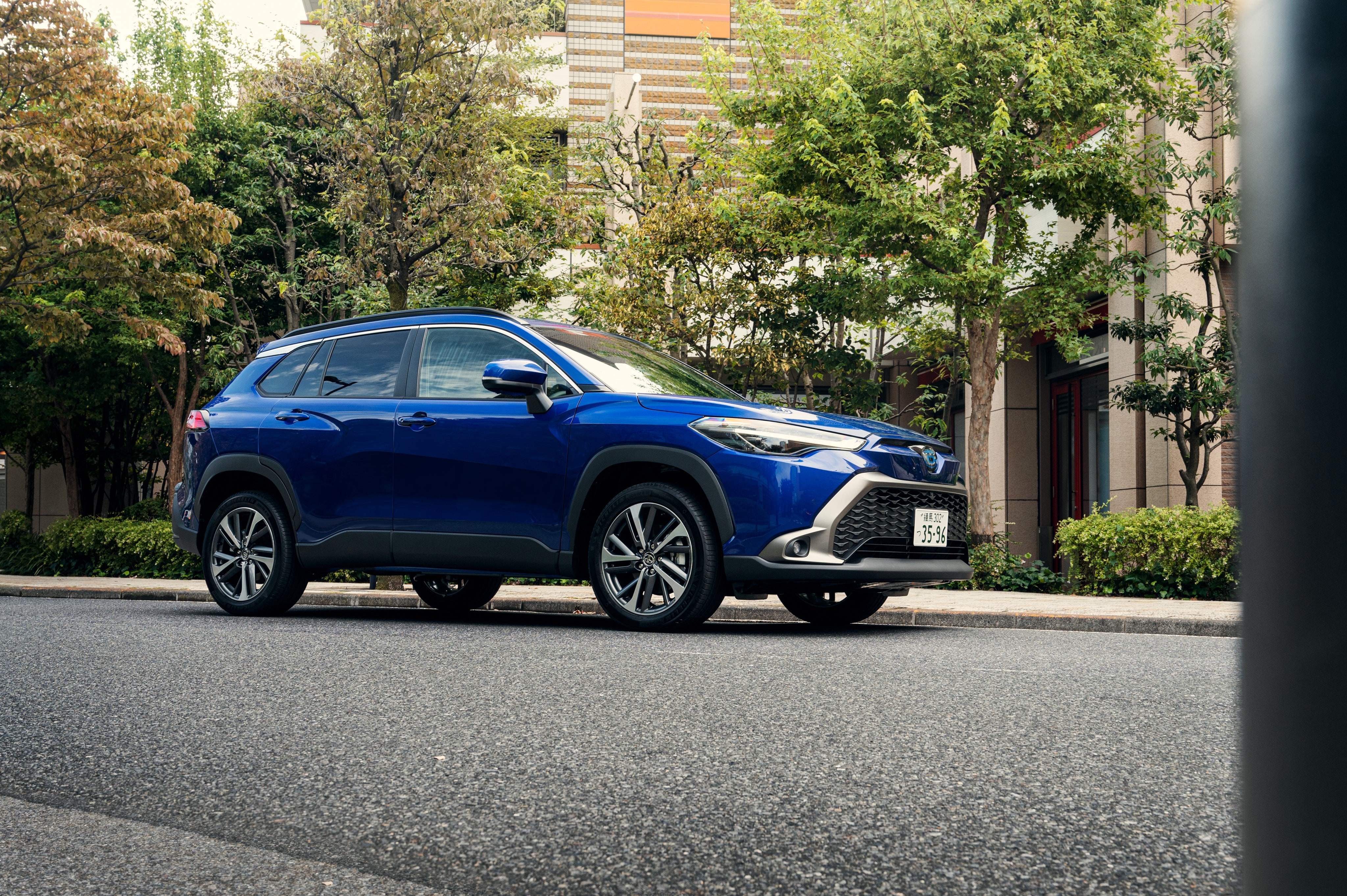 Blue Toyota Corolla Cross Hybrid SUV HD Wallpaper