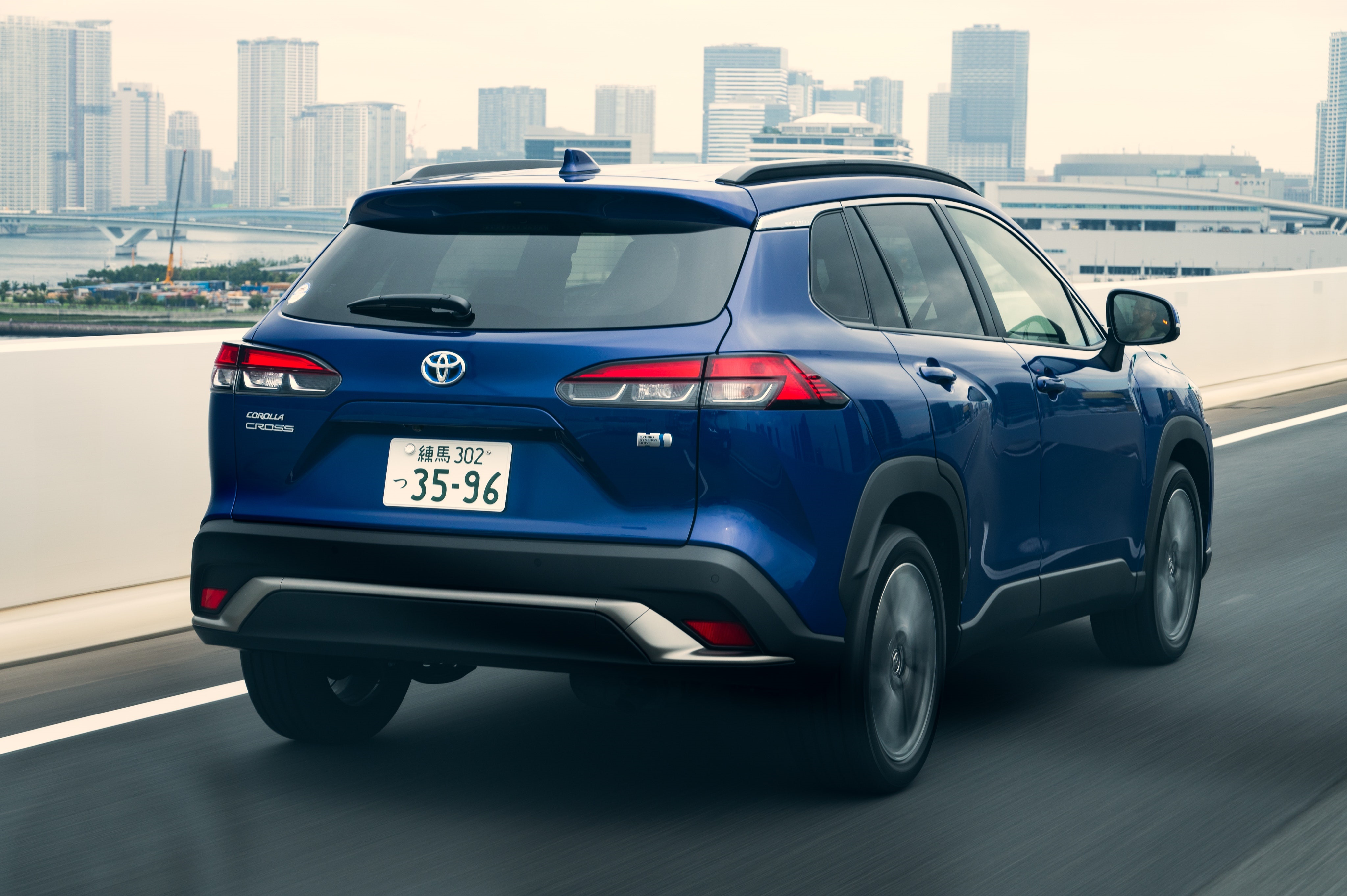 Blue Toyota Corolla Cross Hybrid SUV HD Wallpaper
