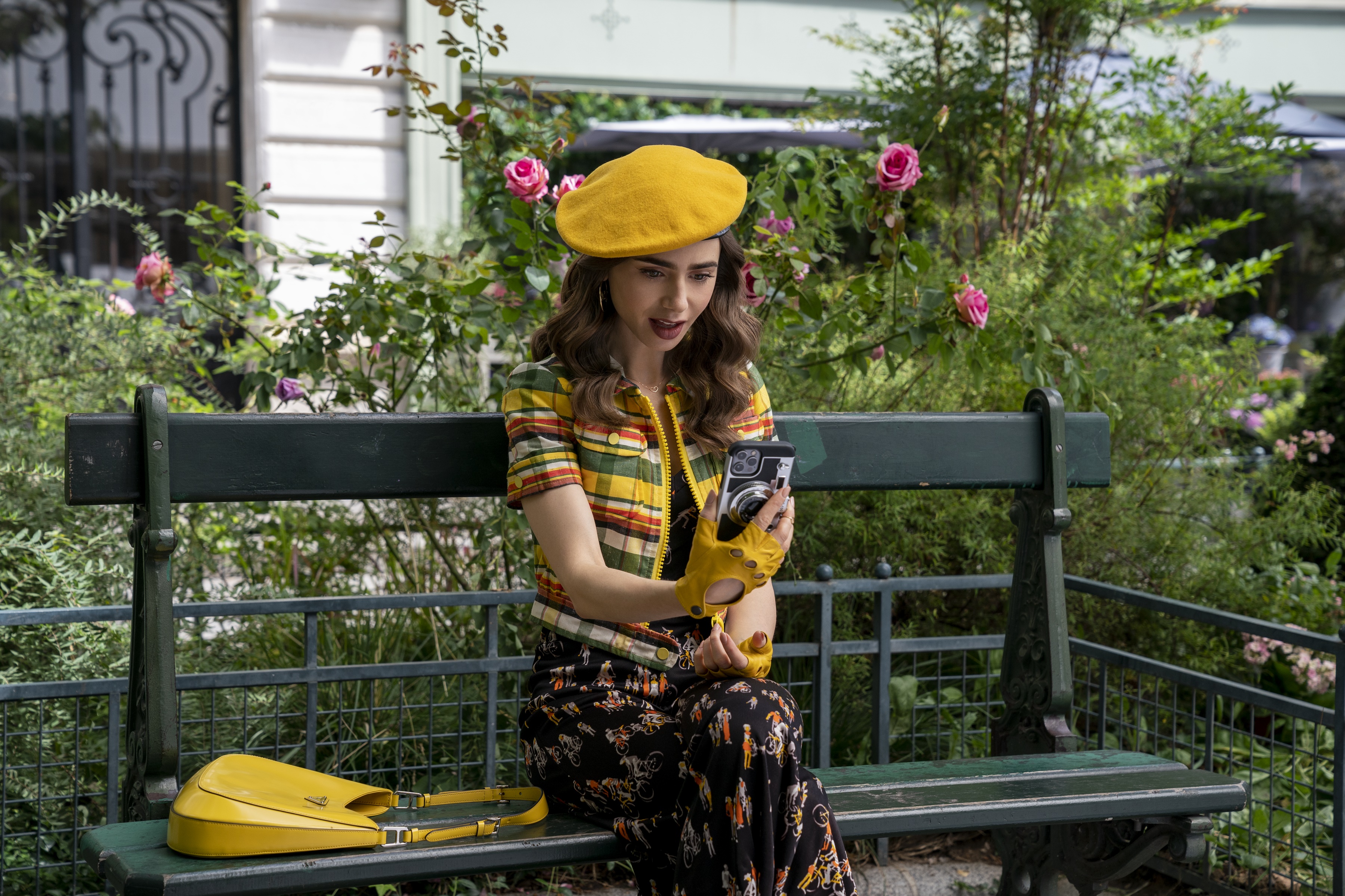 Lily Collins as Emily in Paris on a bench HD Wallpaper