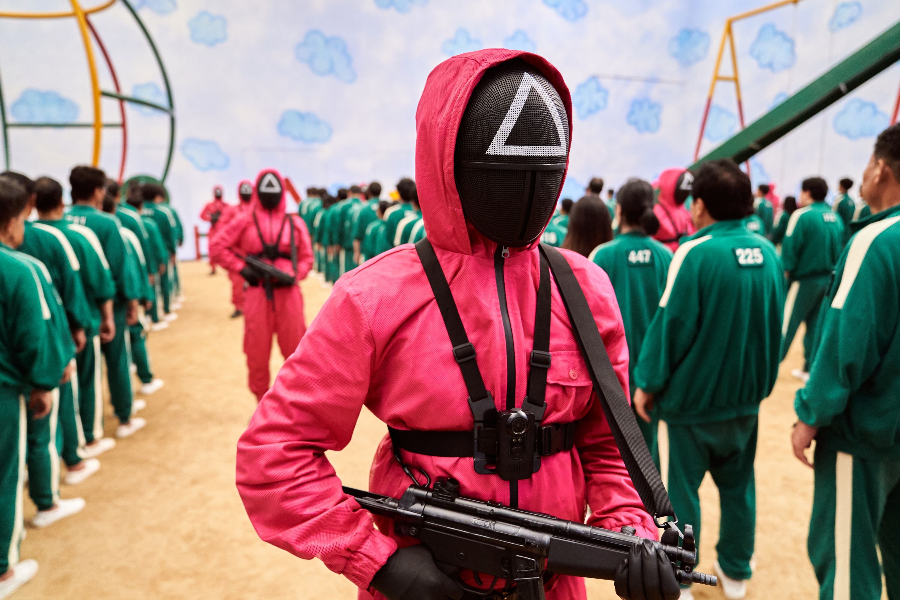 Squid Game Guard with Rifle HD Wallpaper