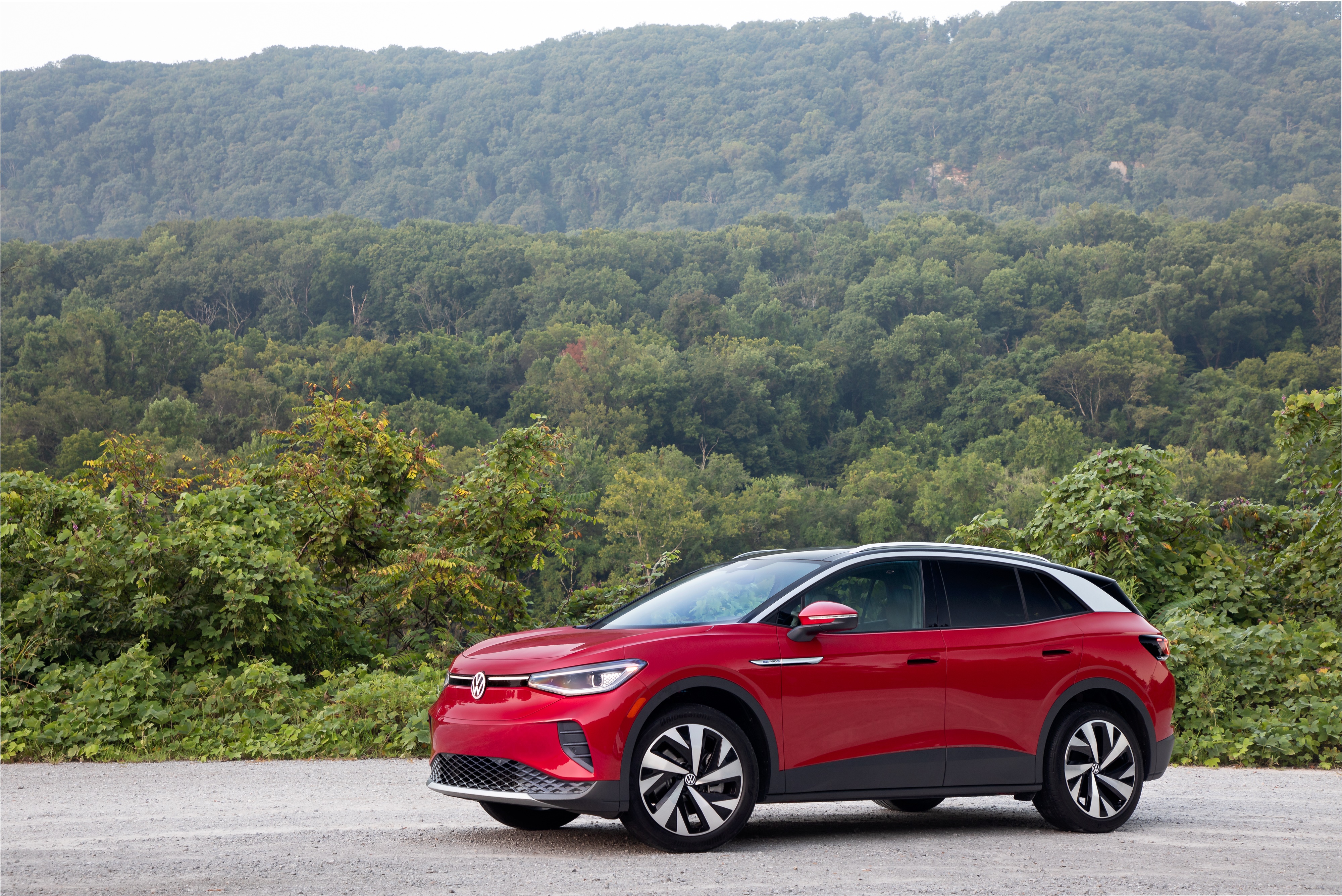 Red Volkswagen ID.4 AWD Pro S electric car HD Wallpaper