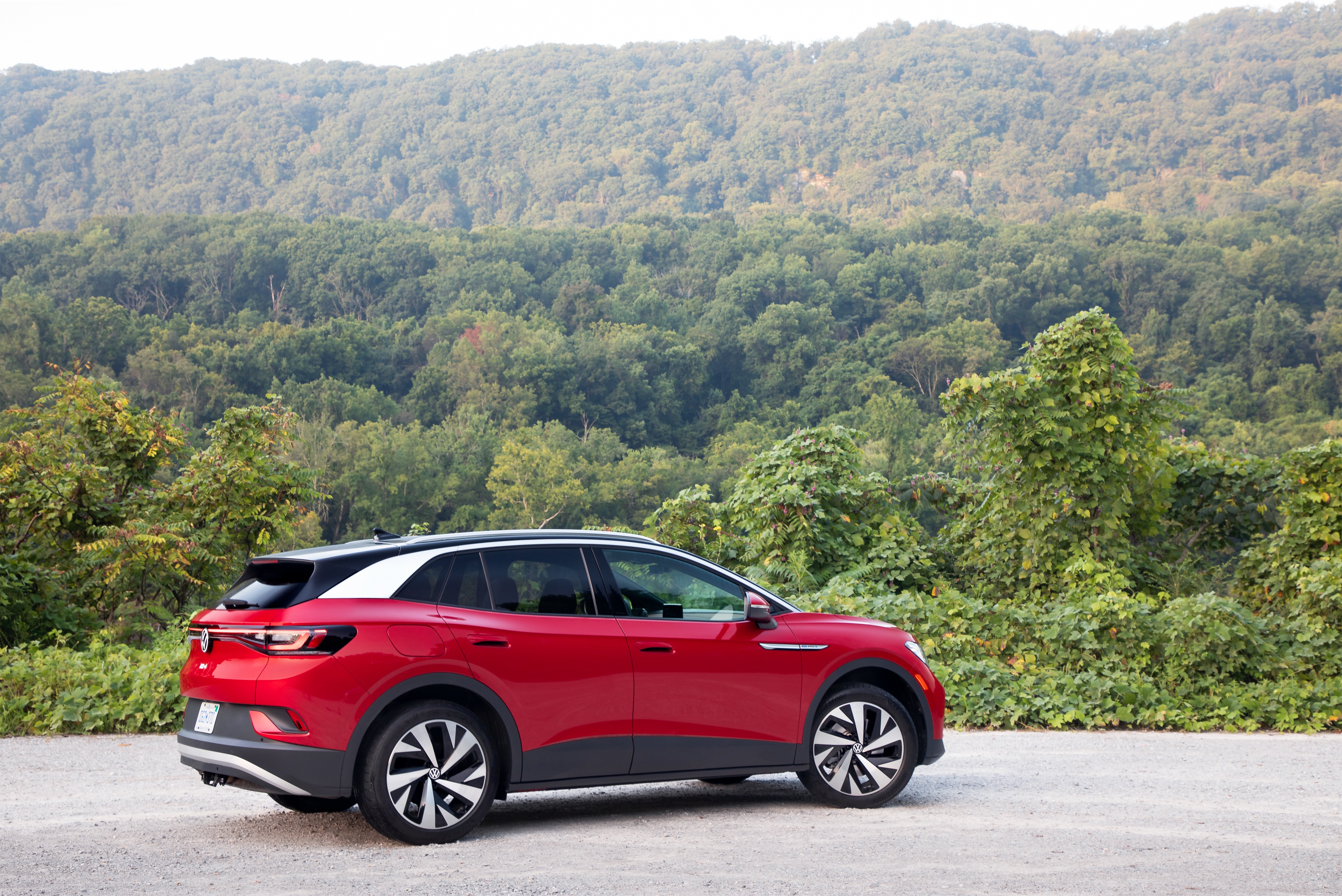 Red Volkswagen ID.4 AWD Pro S electric car HD Wallpaper