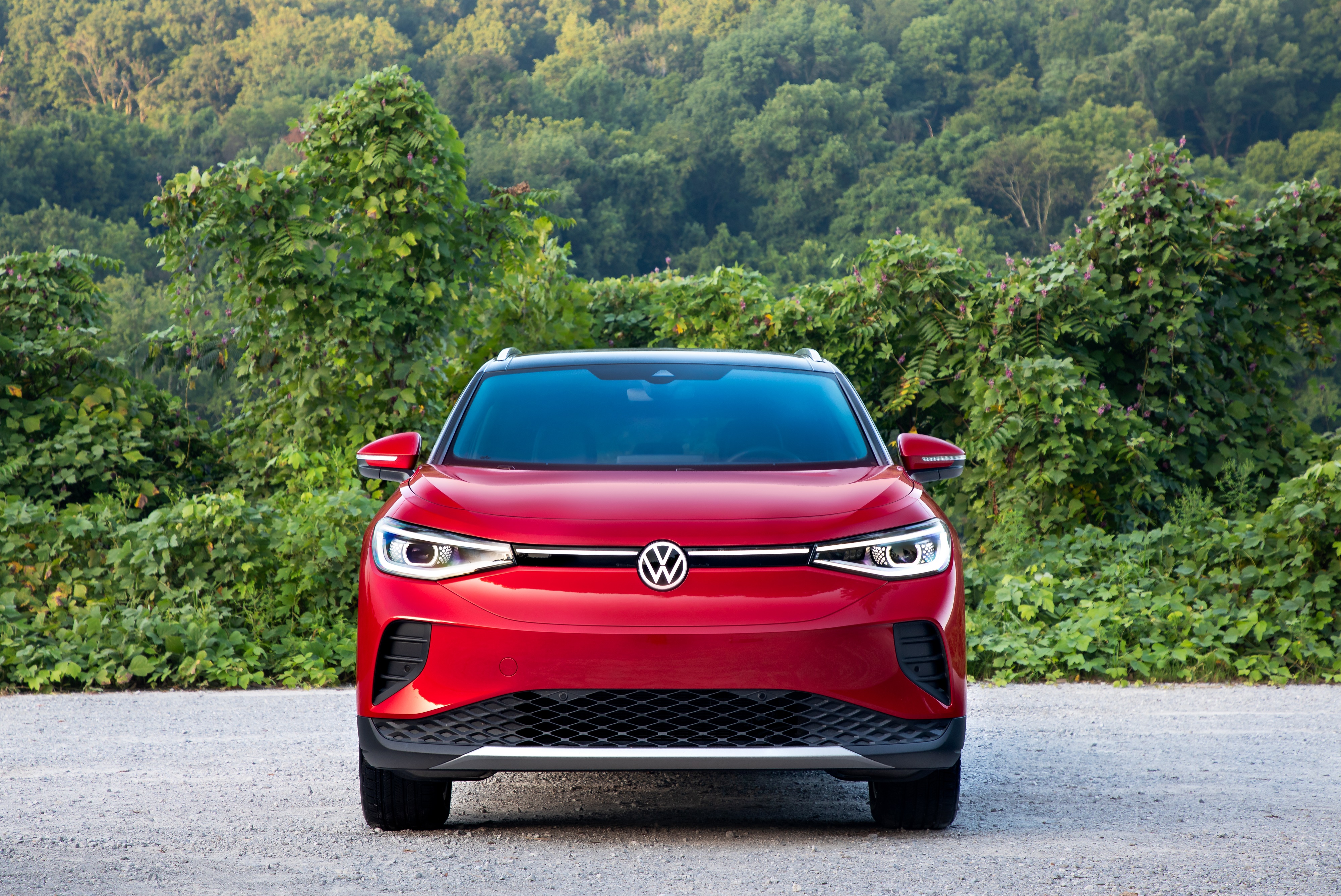Red Volkswagen ID.4 AWD Pro S electric car HD Wallpaper