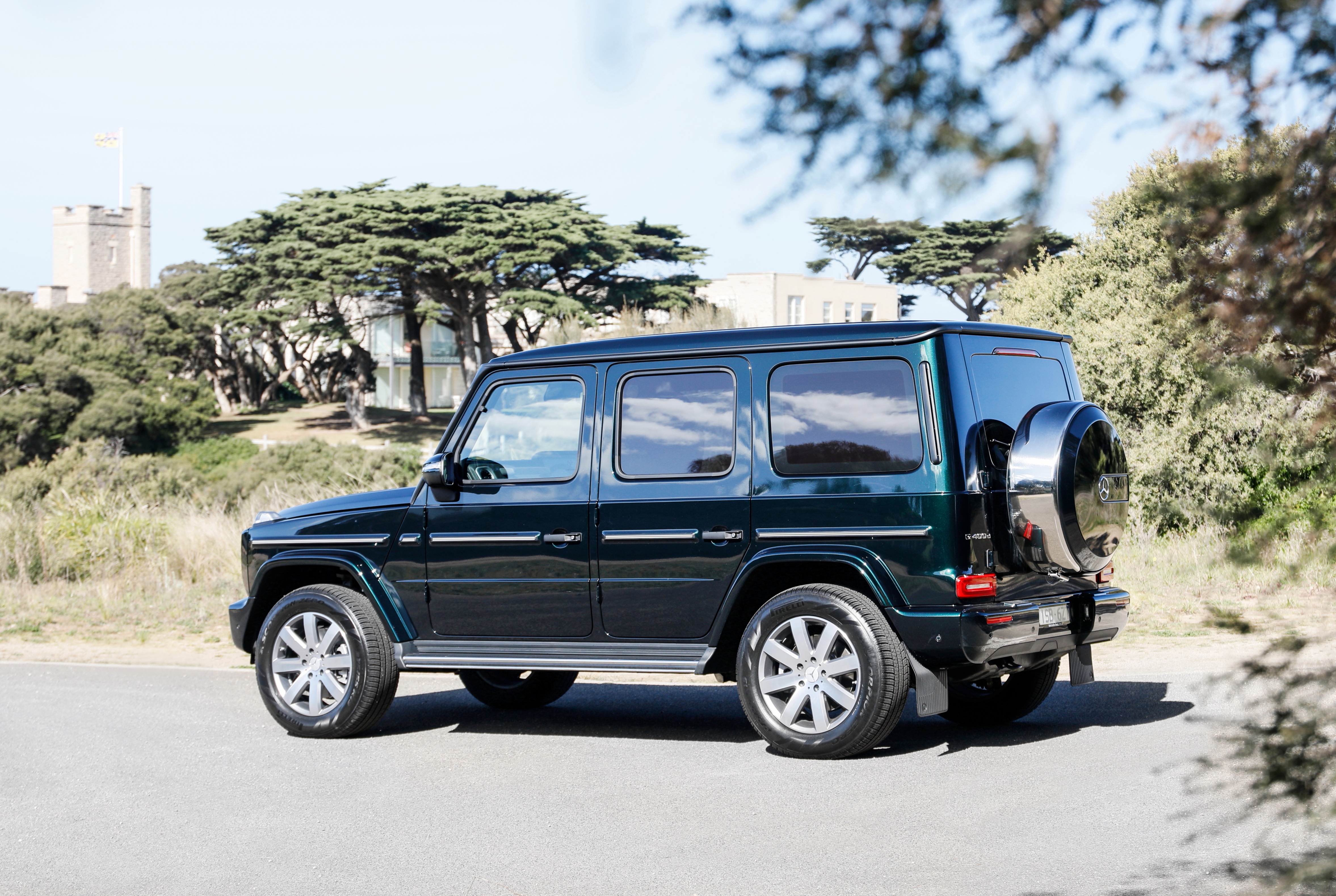 Dark Green Mercedes-Benz G-Class 4x4 parked outdoors HD Wallpaper