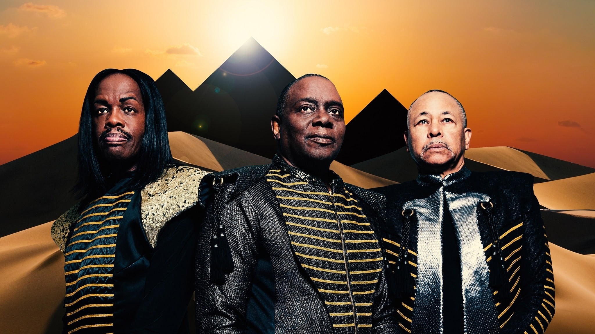 Earth, Wind & Fire in desert with pyramids HD Wallpaper