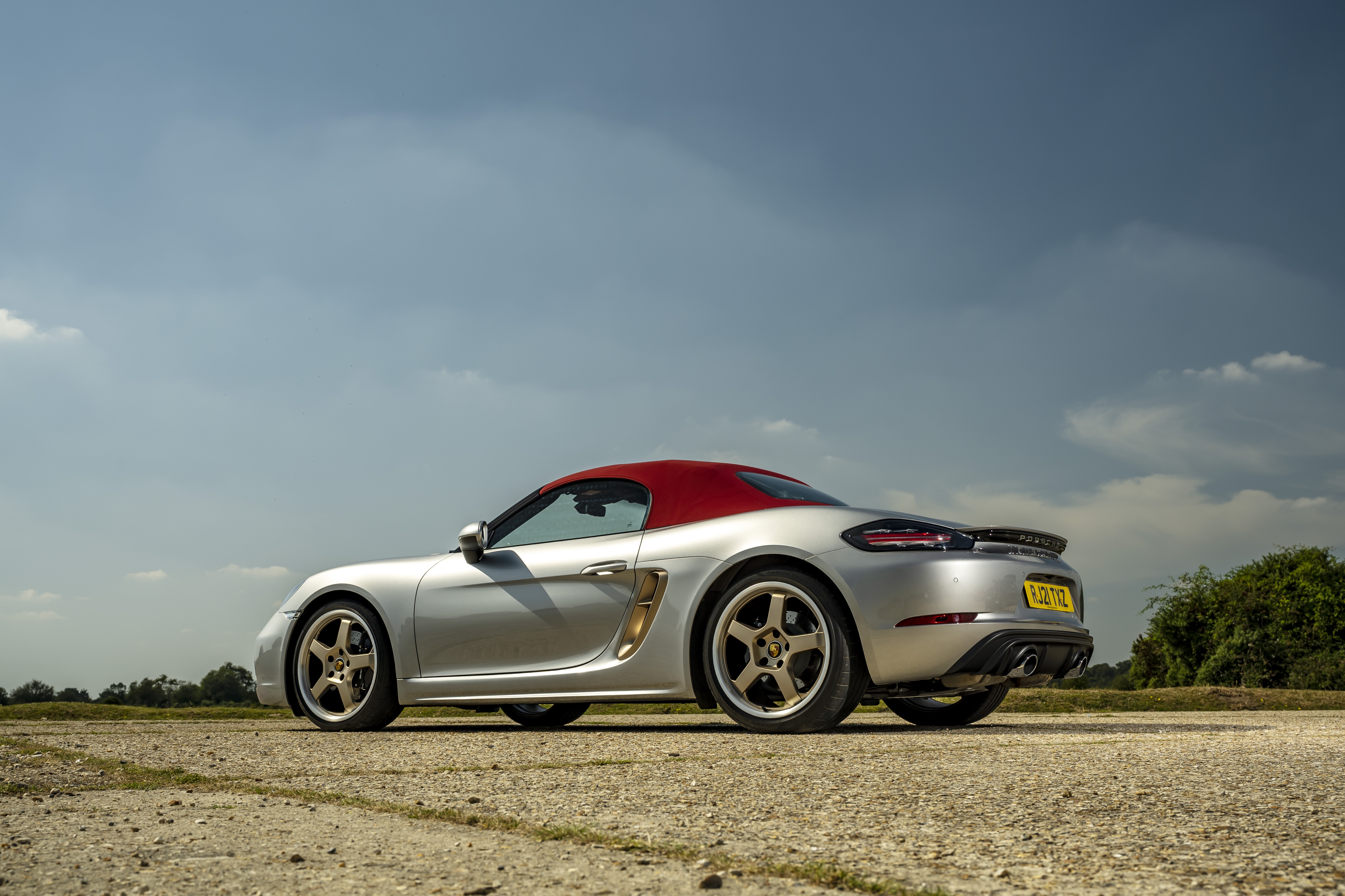 Silver Porsche Boxster Cabriolet with Red Roof HD Wallpaper
