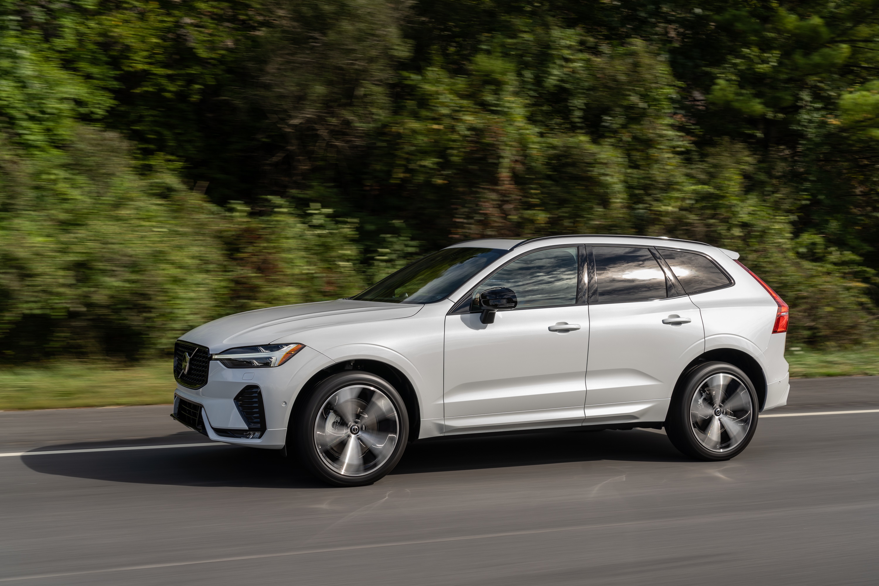 White Volvo XC60 B6 AWD driving on a road HD Wallpaper