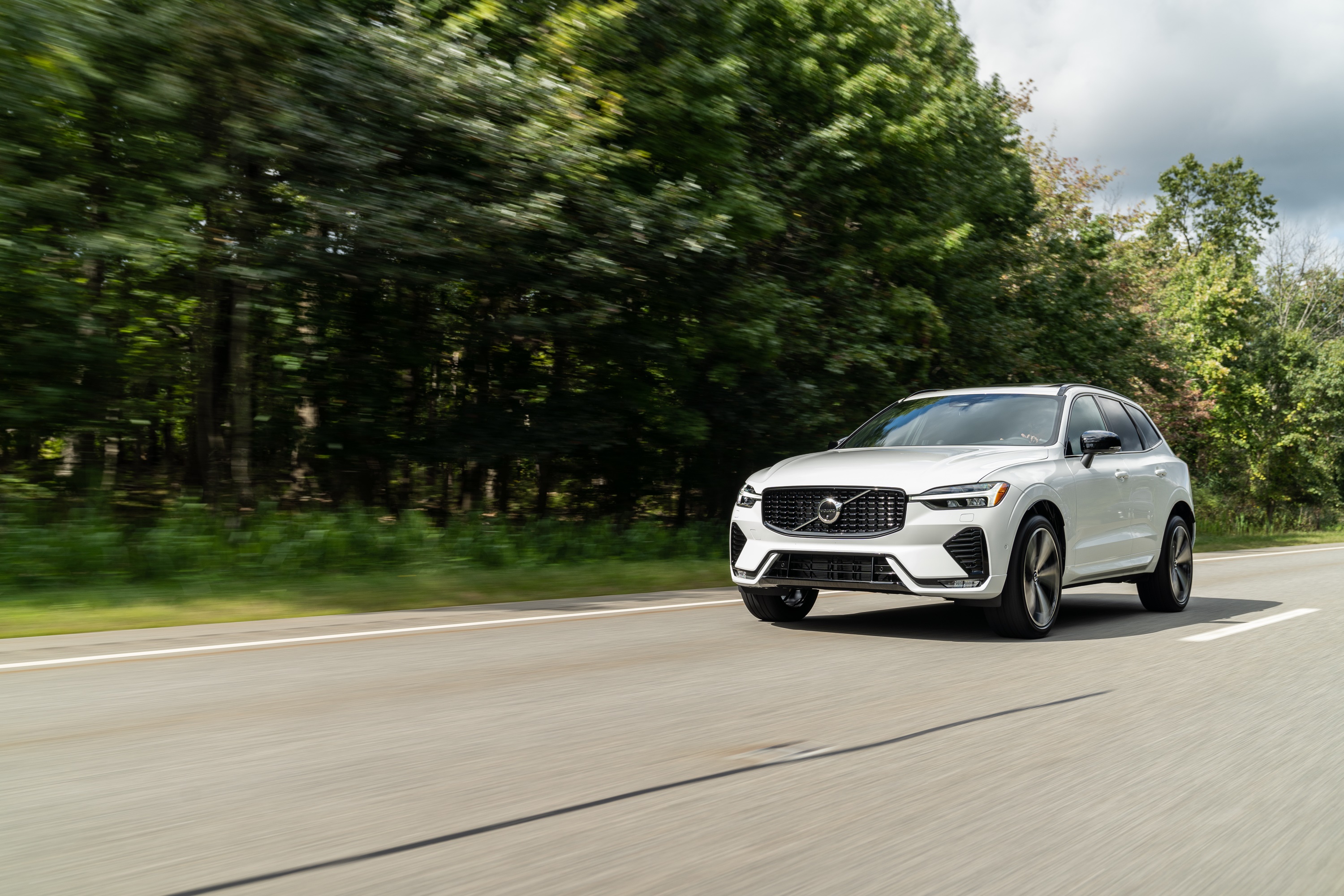 White Volvo XC60 B6 AWD driving on a road HD Wallpaper