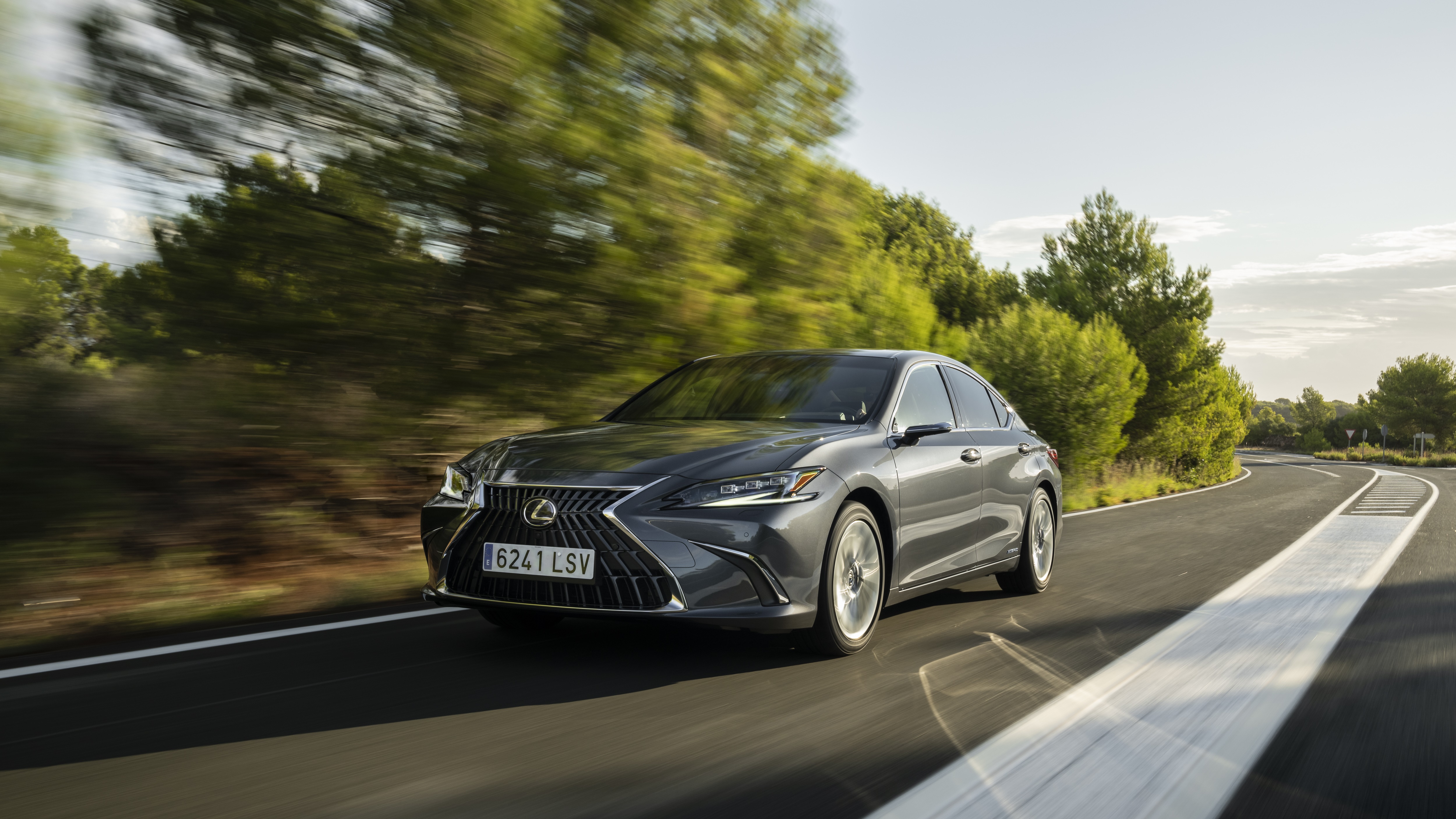Lexus ES 300H driving on a road HD Wallpaper