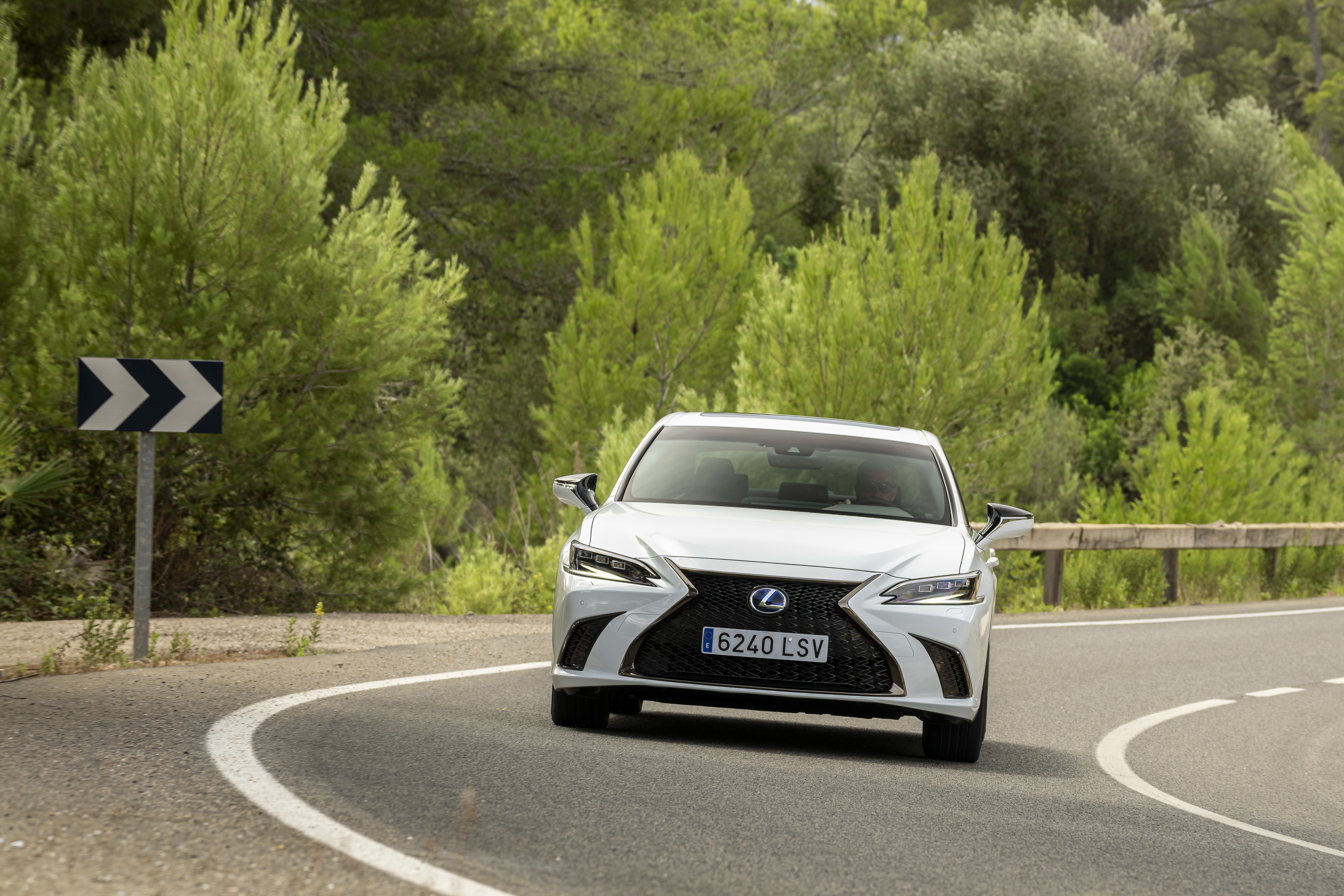 White Lexus ES 300h F SPORT on a winding road HD Wallpaper