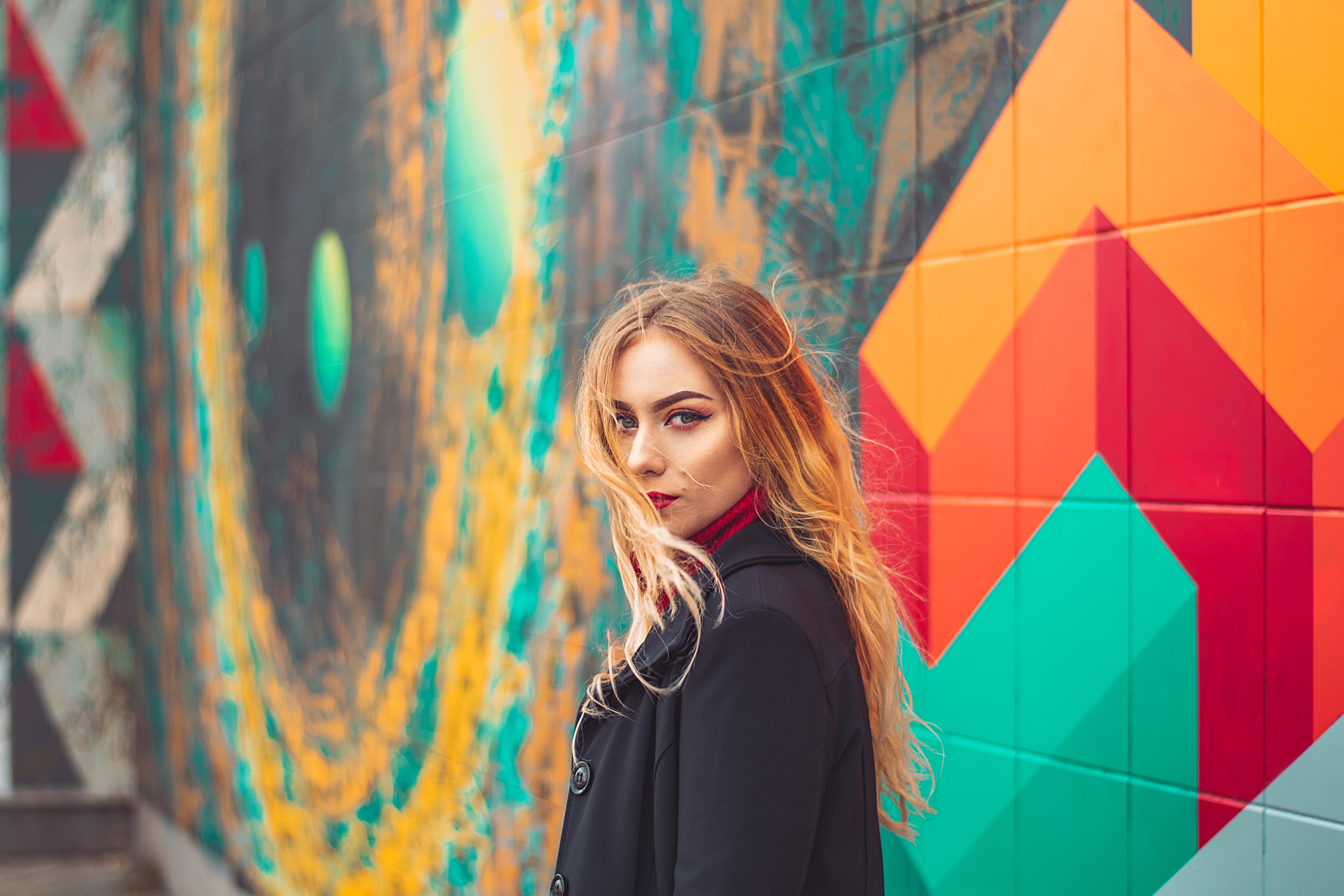Model in front of colorful mural HD Wallpaper