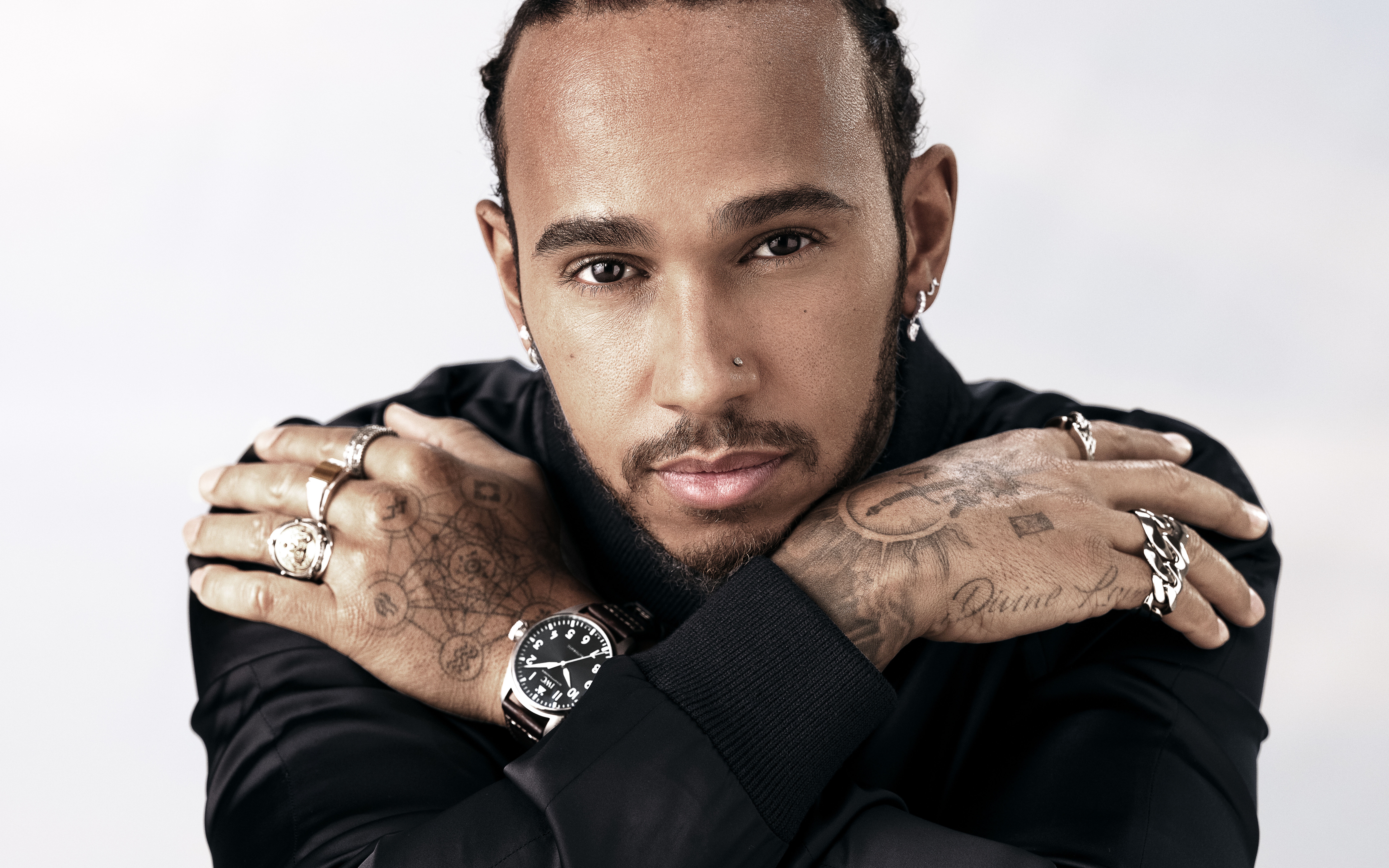 Lewis Hamilton wearing a watch and rings HD Wallpaper