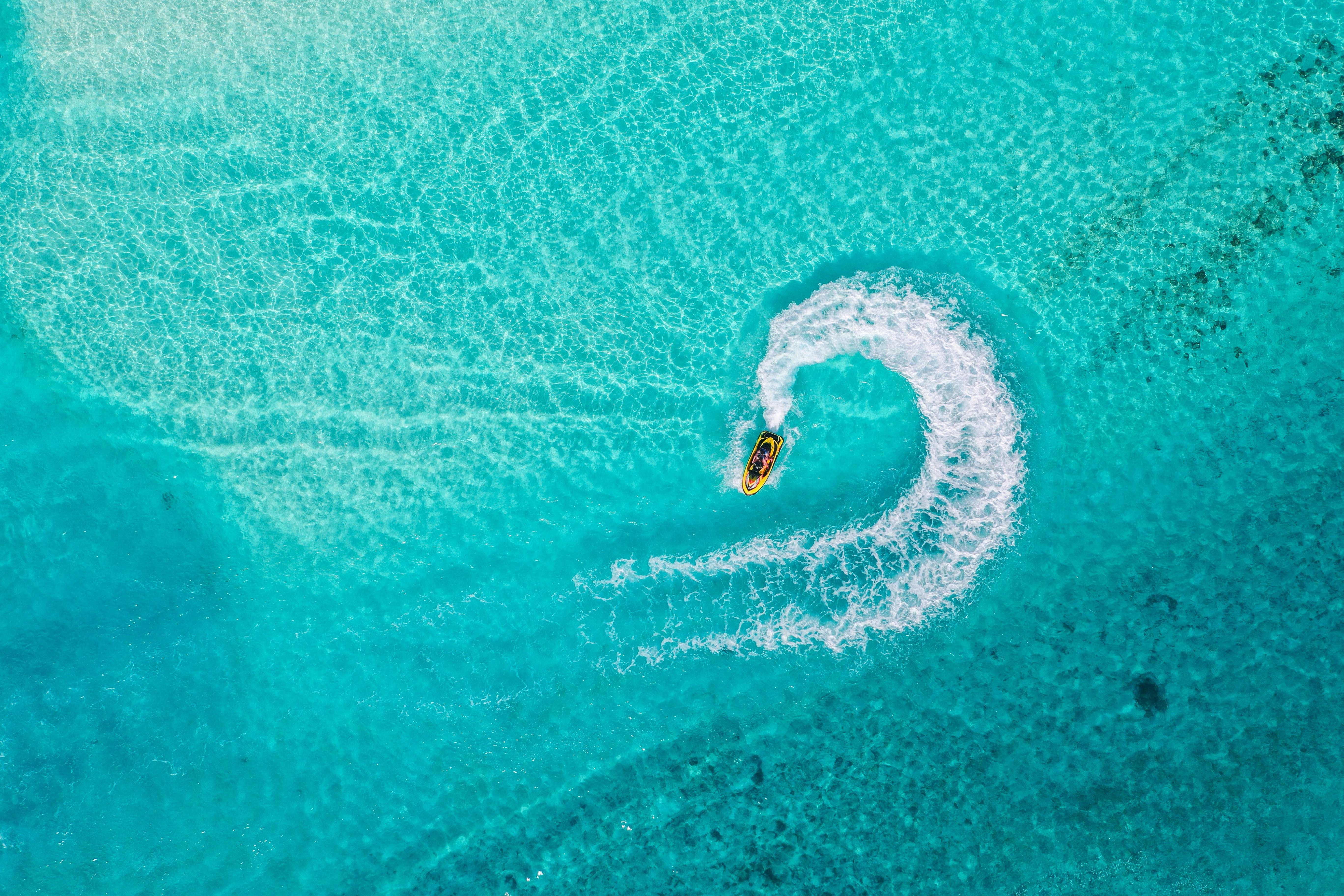 Jet ski in turquoise water 4K HD Wallpaper