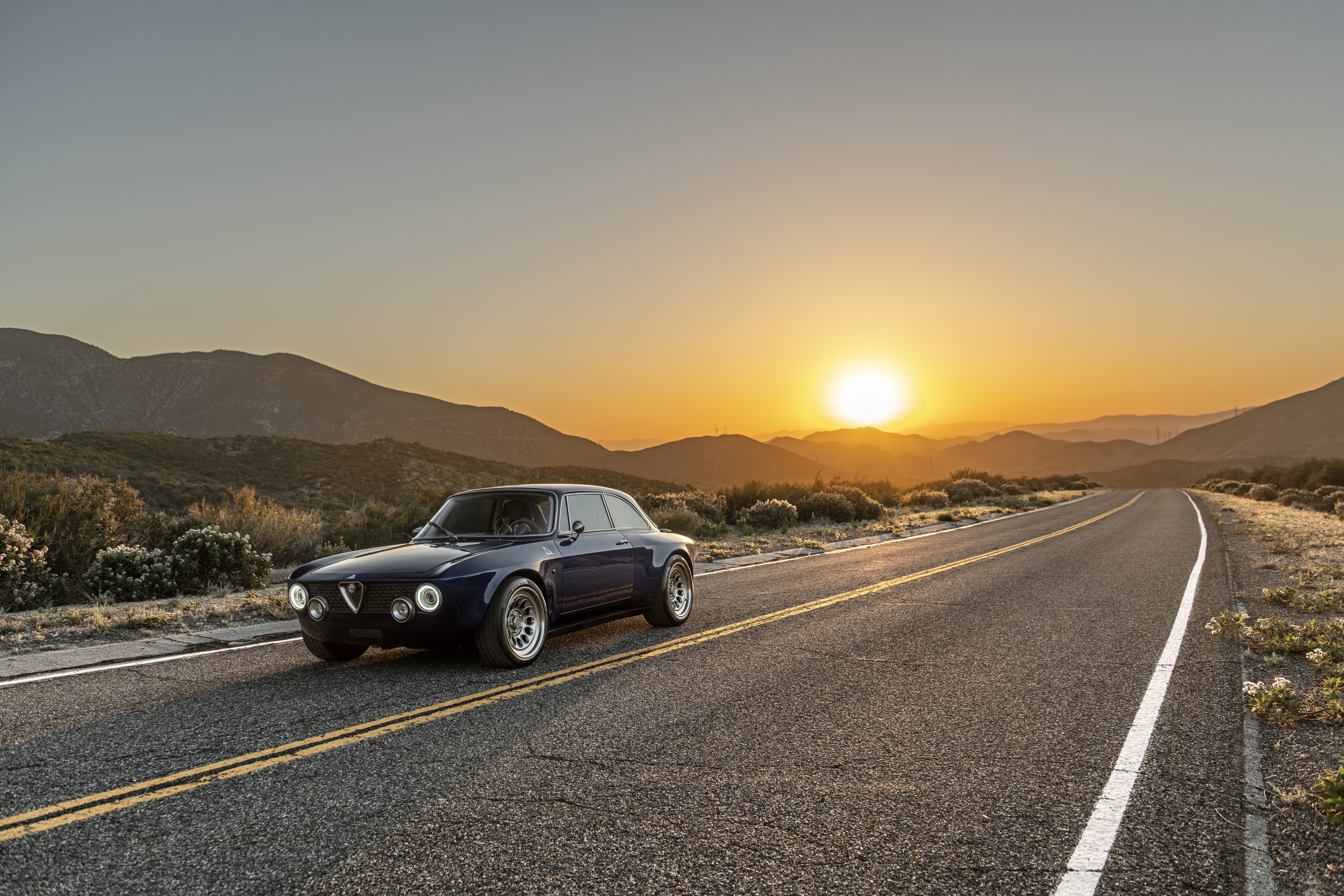 Totem Automobili GT Electric Car on a Road at Sunset HD Wallpaper