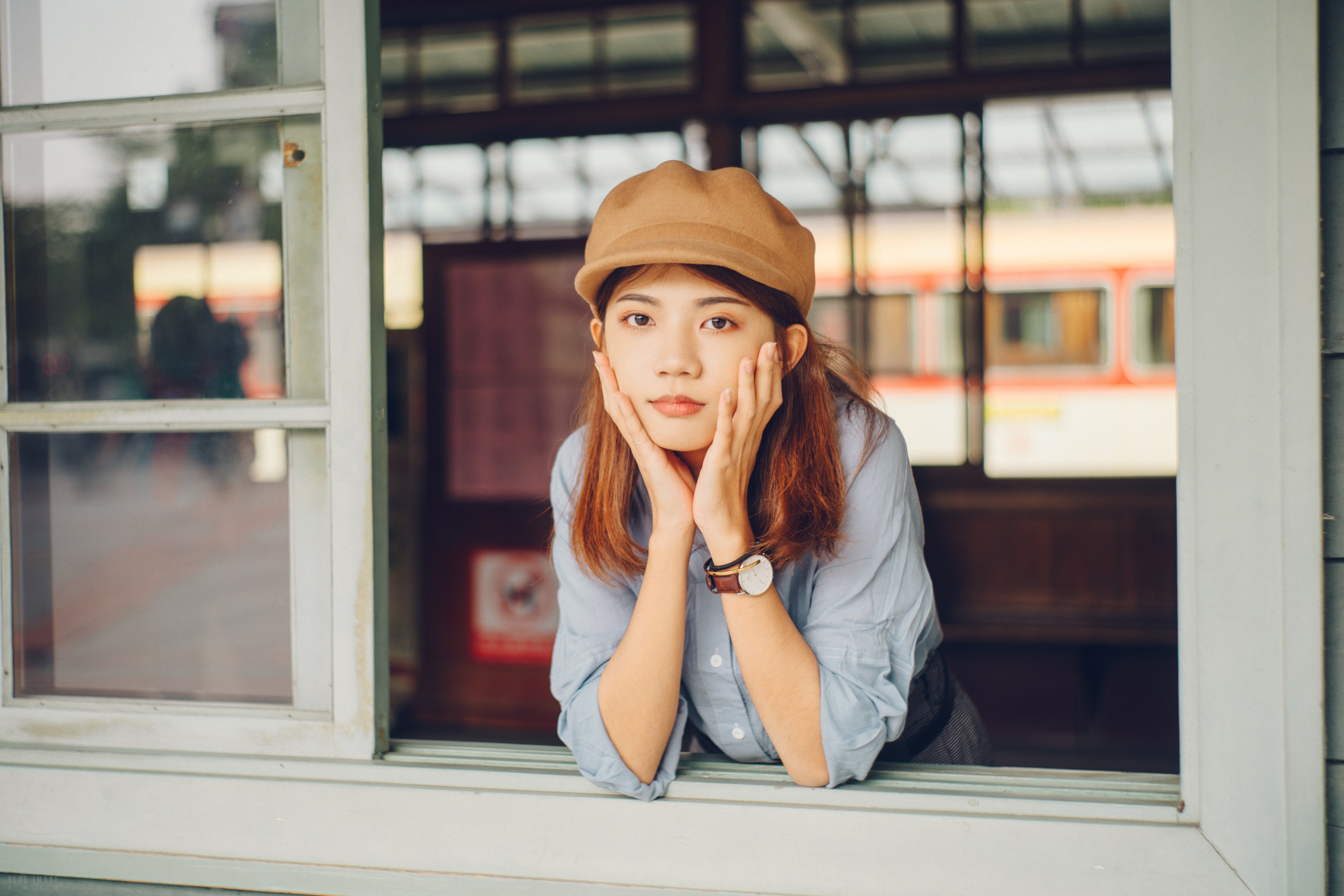 Asian girl wearing a cap and blue shirt HD Wallpaper