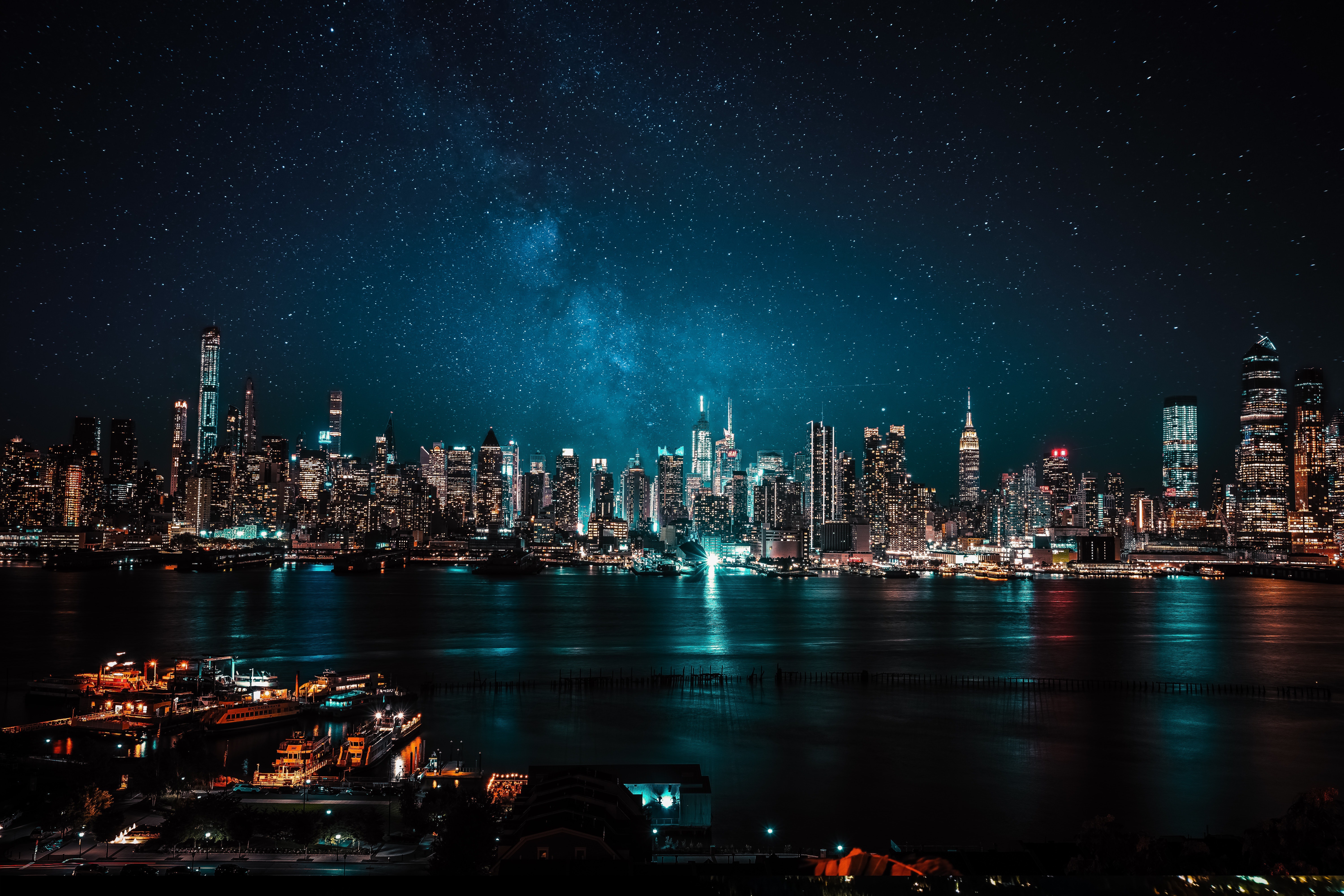 New York City Skyline at Night with Starry Sky HD Wallpaper