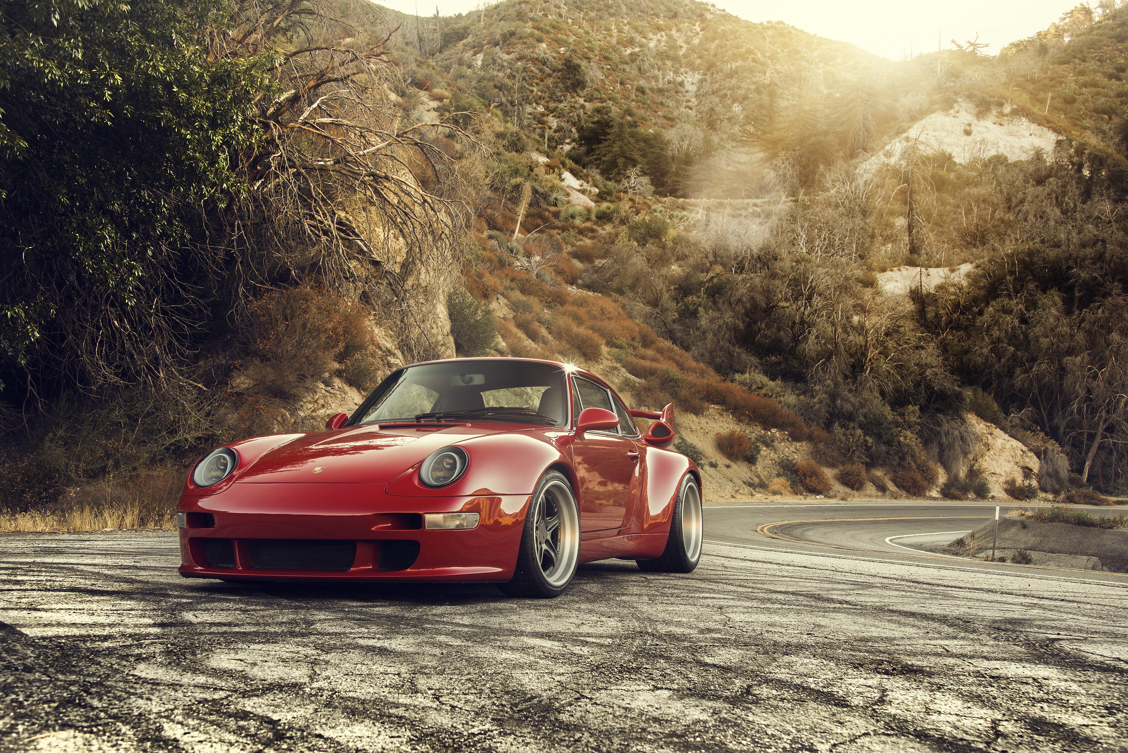 Red Porsche 993 Gunther Werks 400R on a mountain road HD Wallpaper
