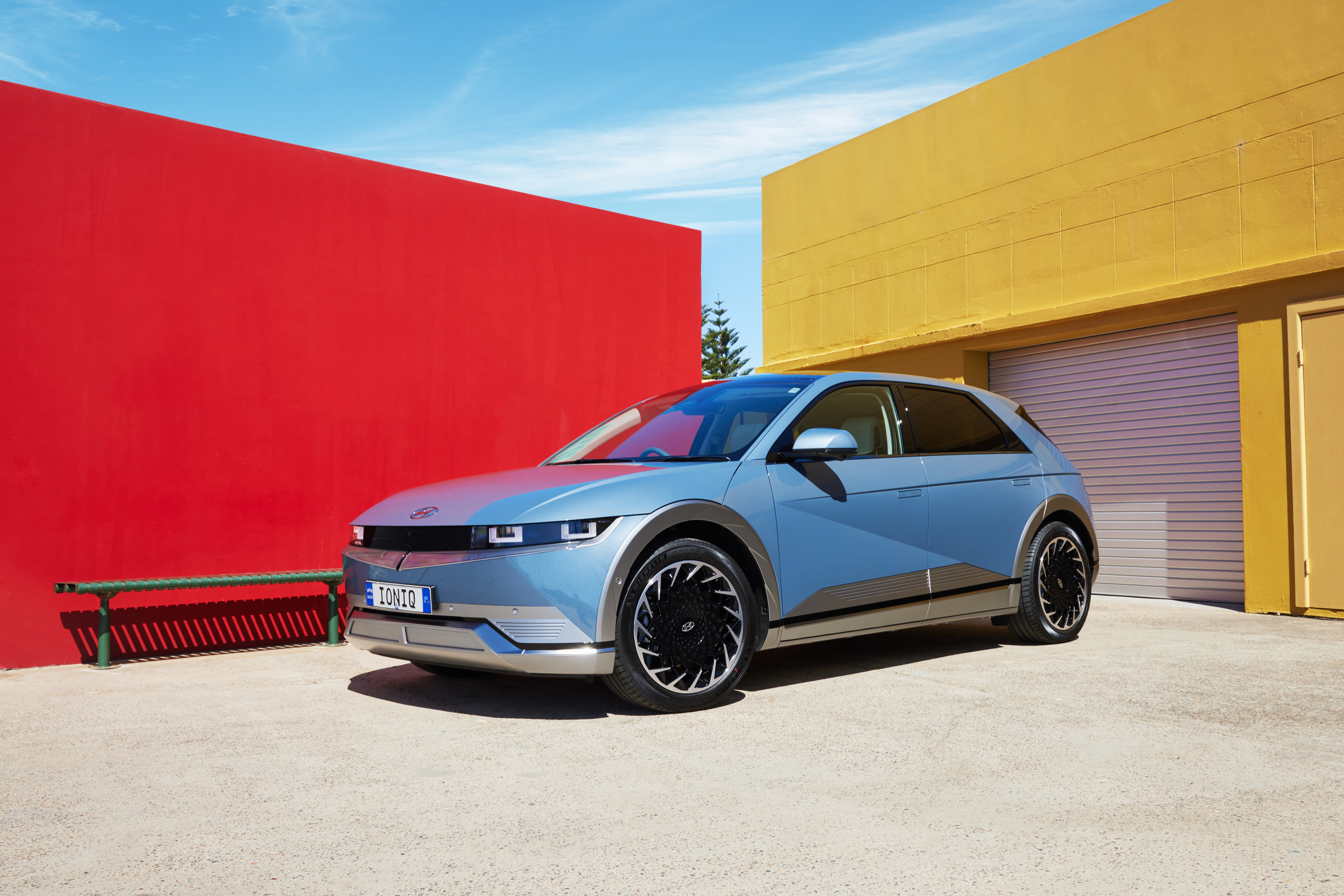 Blue Hyundai Ioniq 5 SUV parked outdoors HD Wallpaper