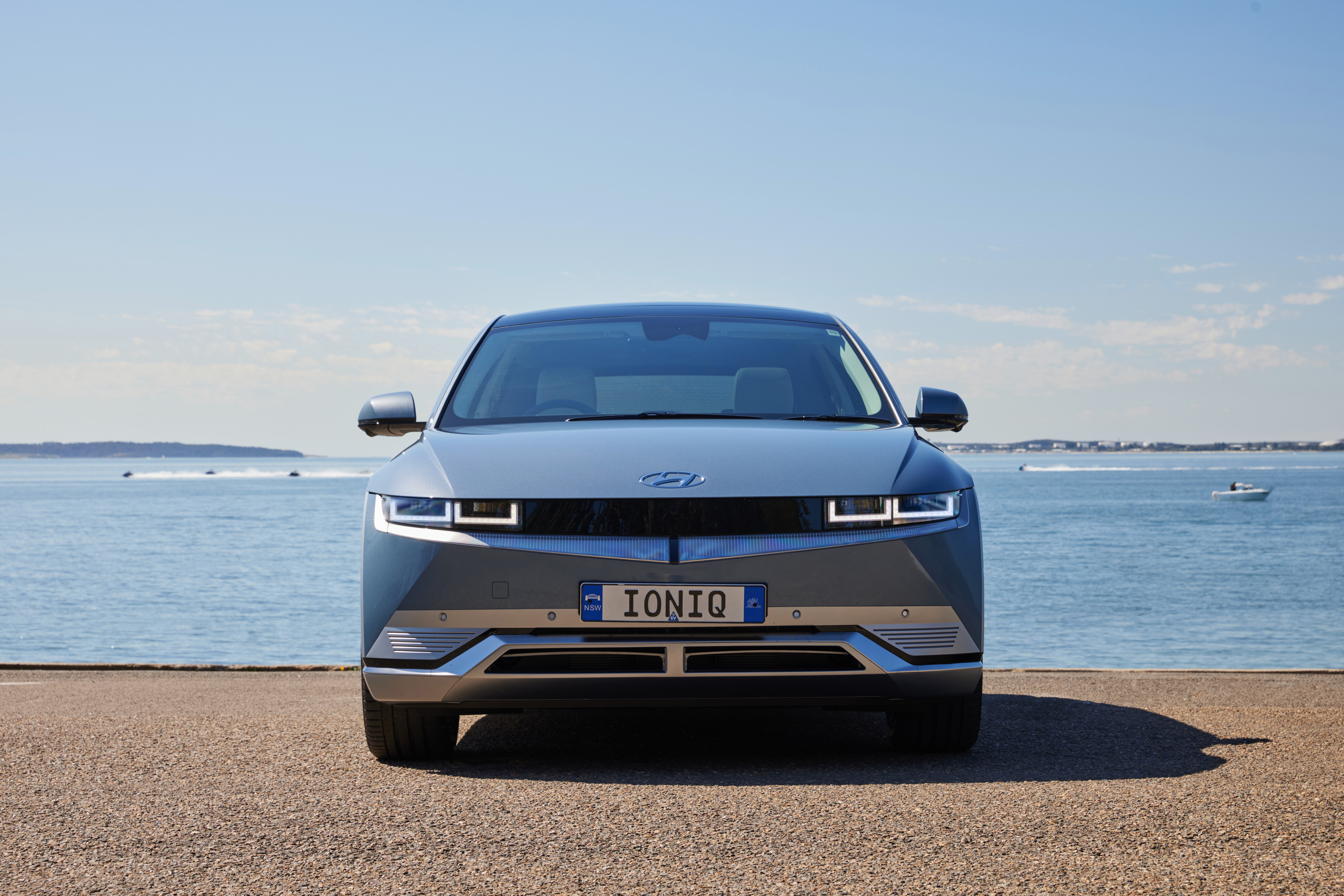 Hyundai Ioniq 5 electric car parked by the sea HD Wallpaper