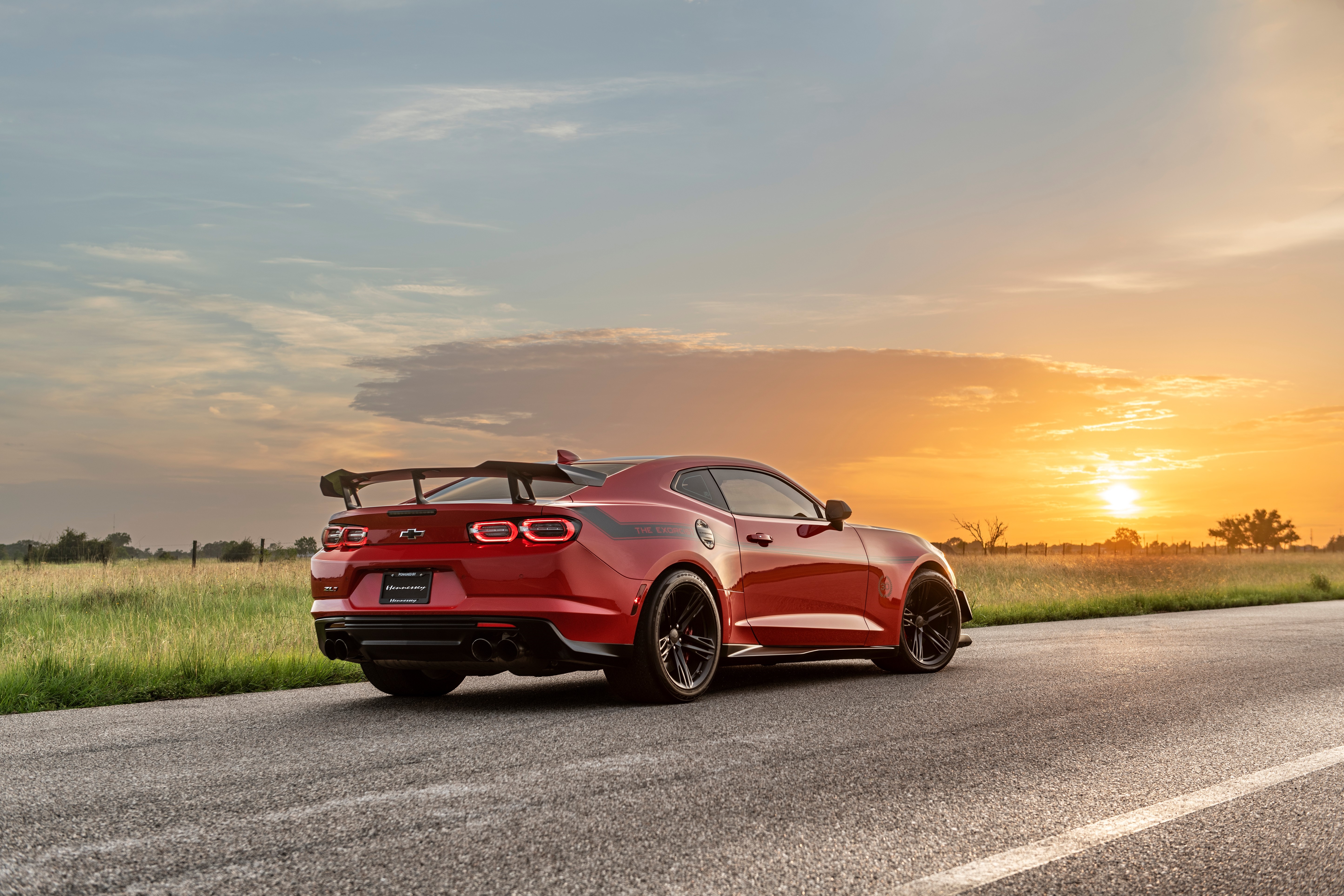 Red Chevrolet Camaro ZL1 4K on a road at sunset HD Wallpaper