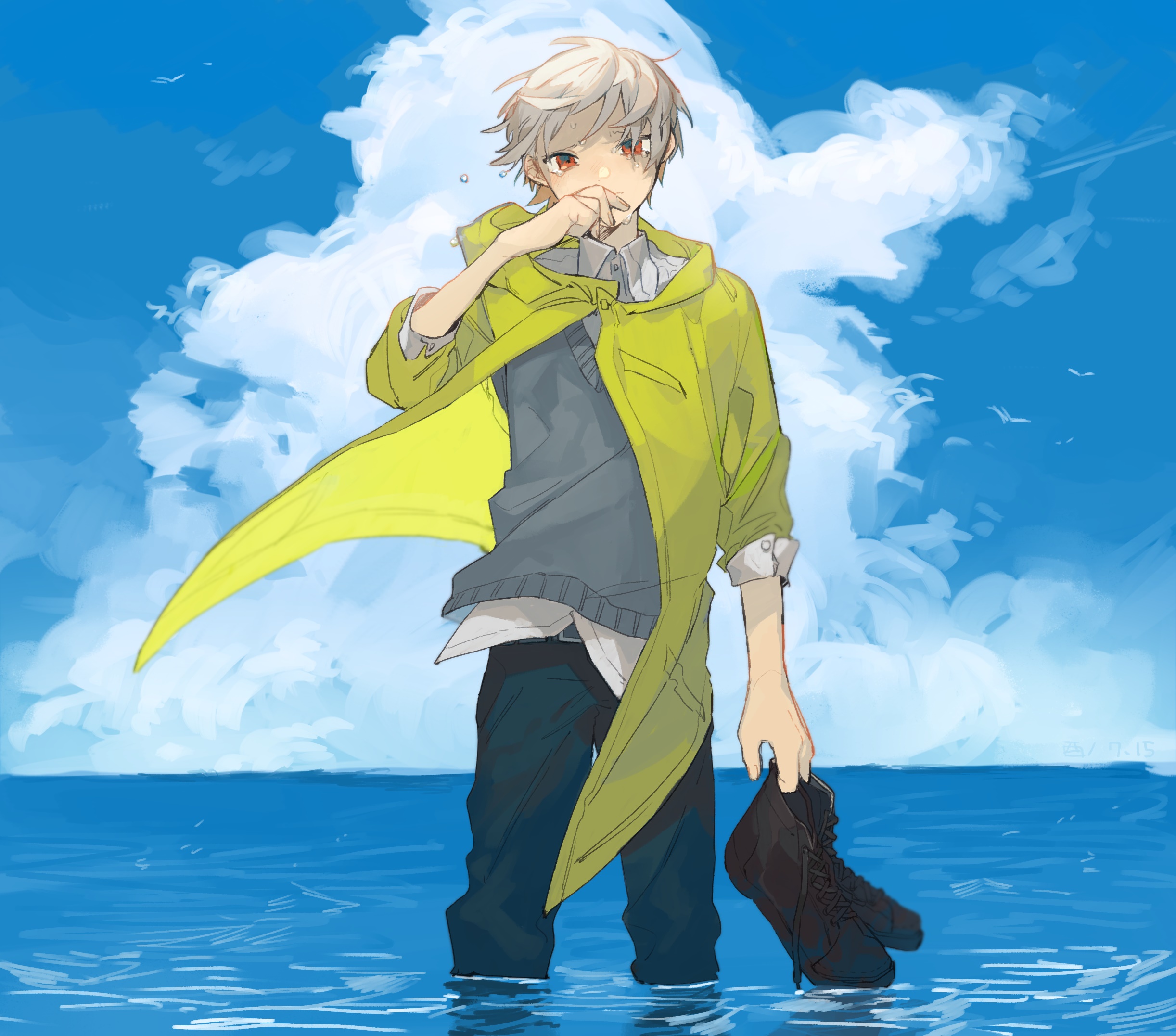 Boy in yellow coat standing in water HD Wallpaper