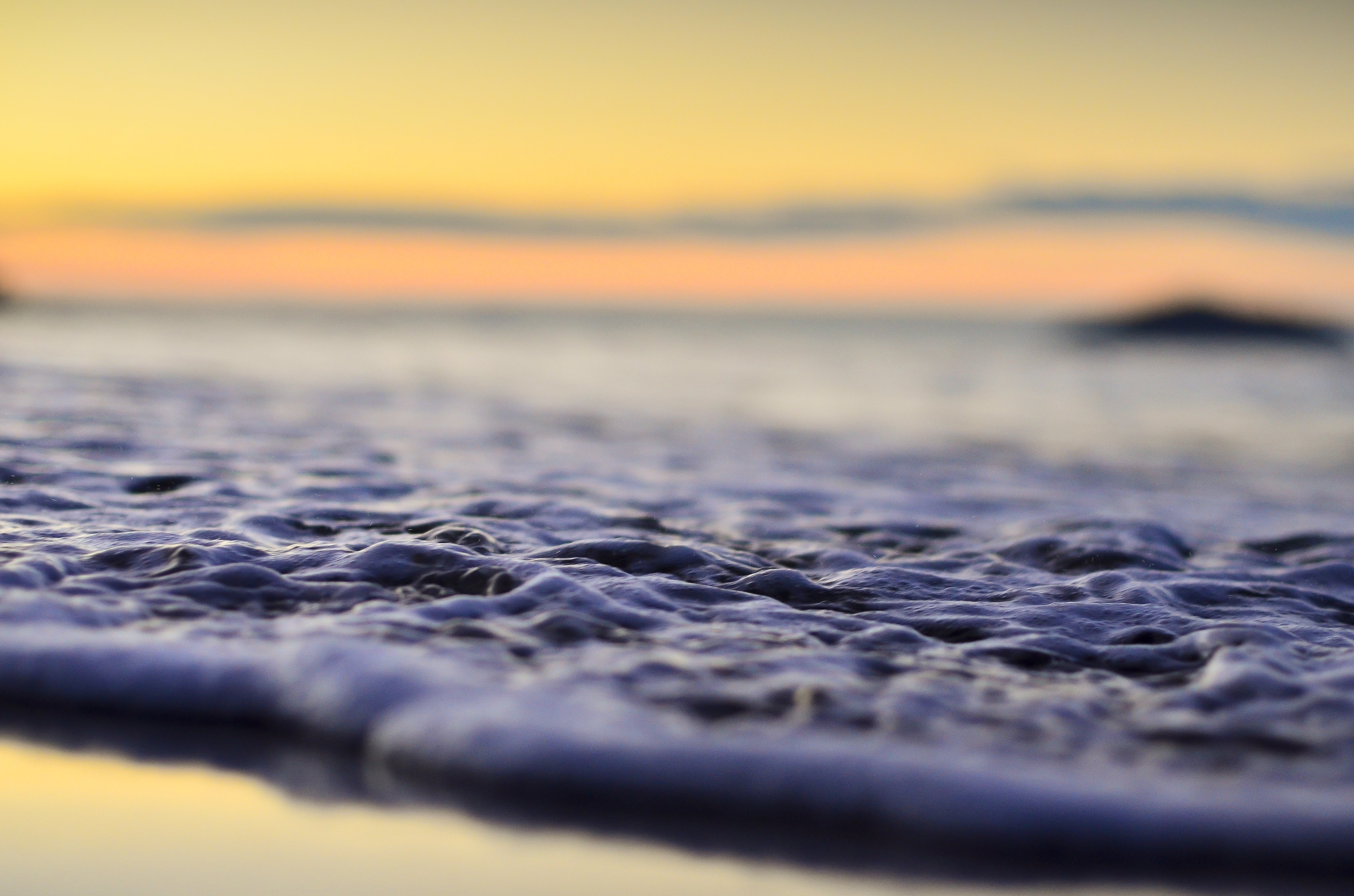 Ocean waves with sunset sky HD Wallpaper