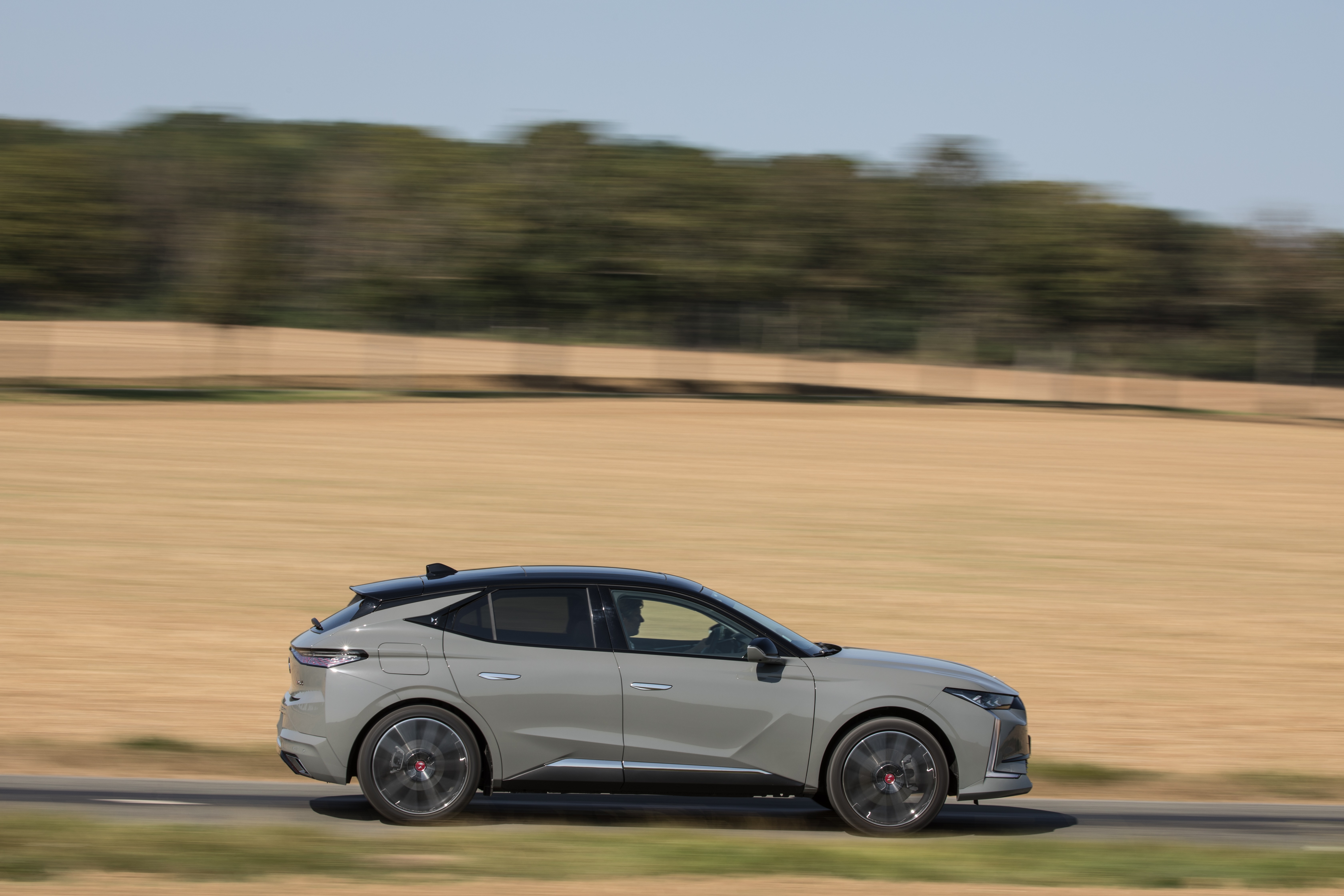 DS 4 Performance Line electric car driving on a road HD Wallpaper