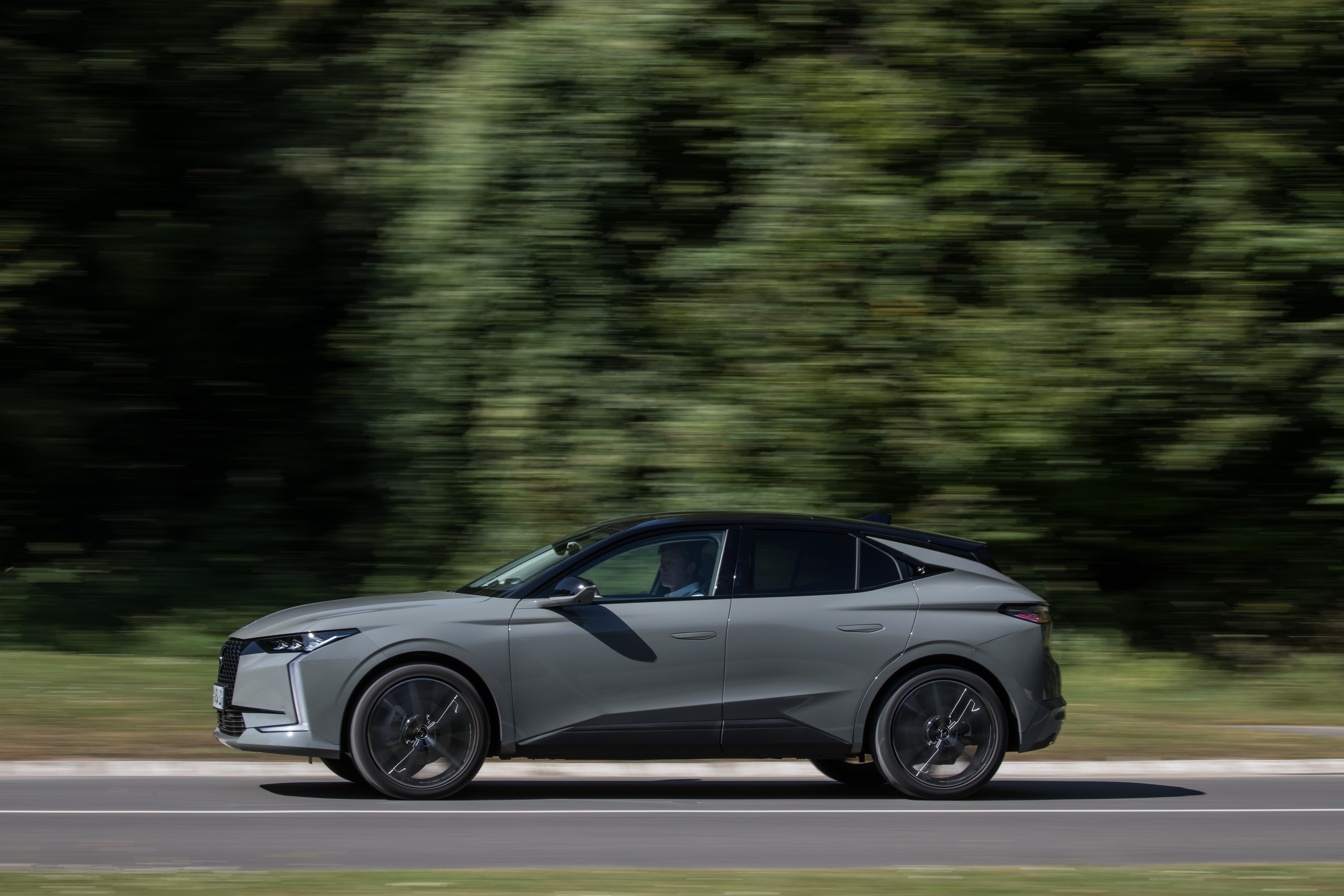 DS 4 Performance Line electric car driving on a road HD Wallpaper