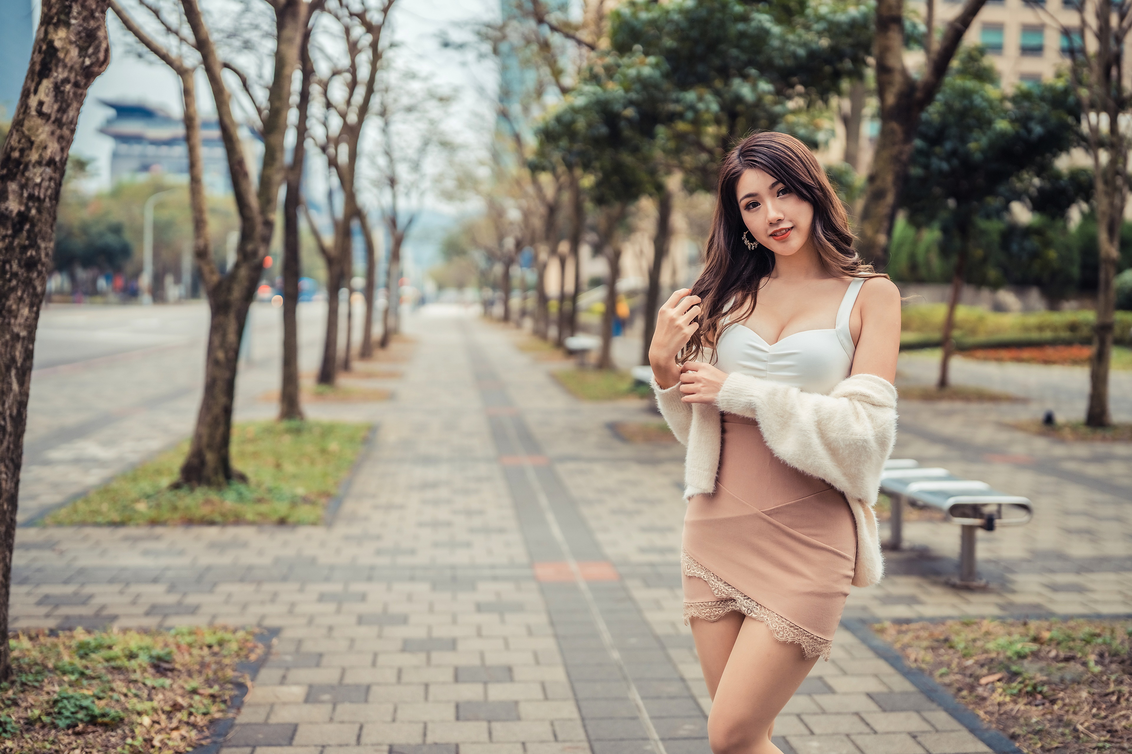 Asian woman with brunette hair in a park HD Wallpaper