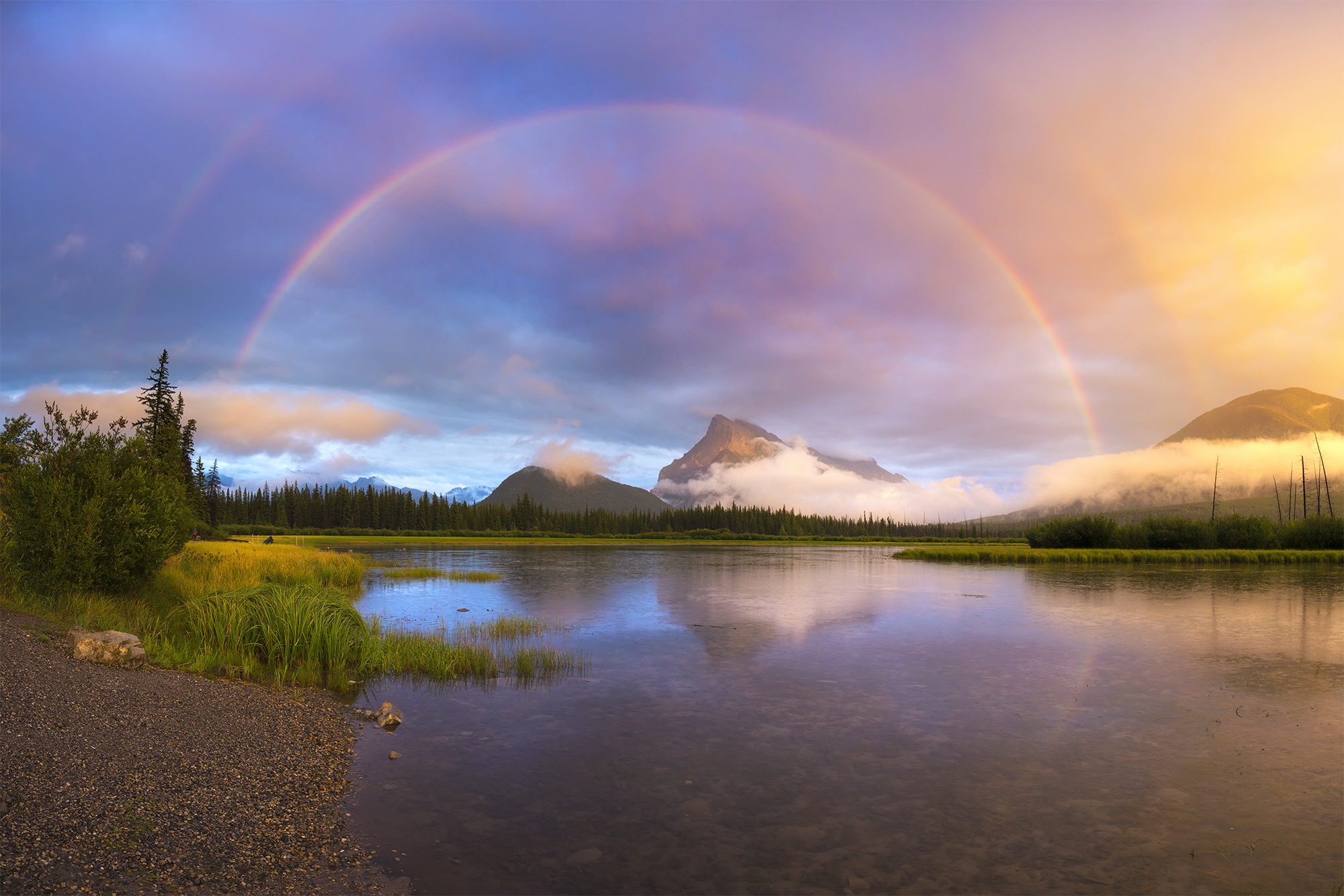 Double rainbow over a lake and mountains HD Wallpaper