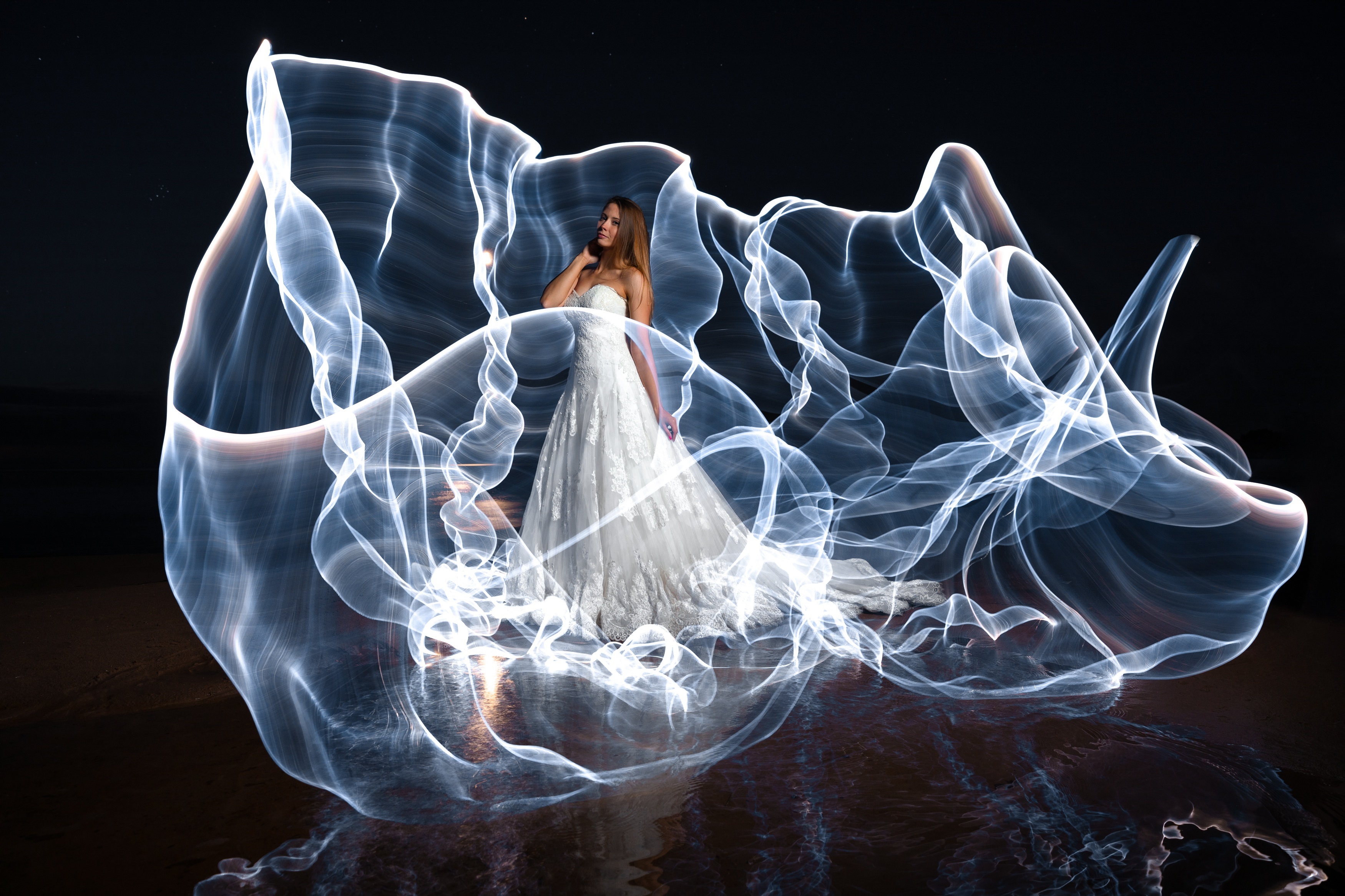 Bride in a wedding dress with light painting HD Wallpaper