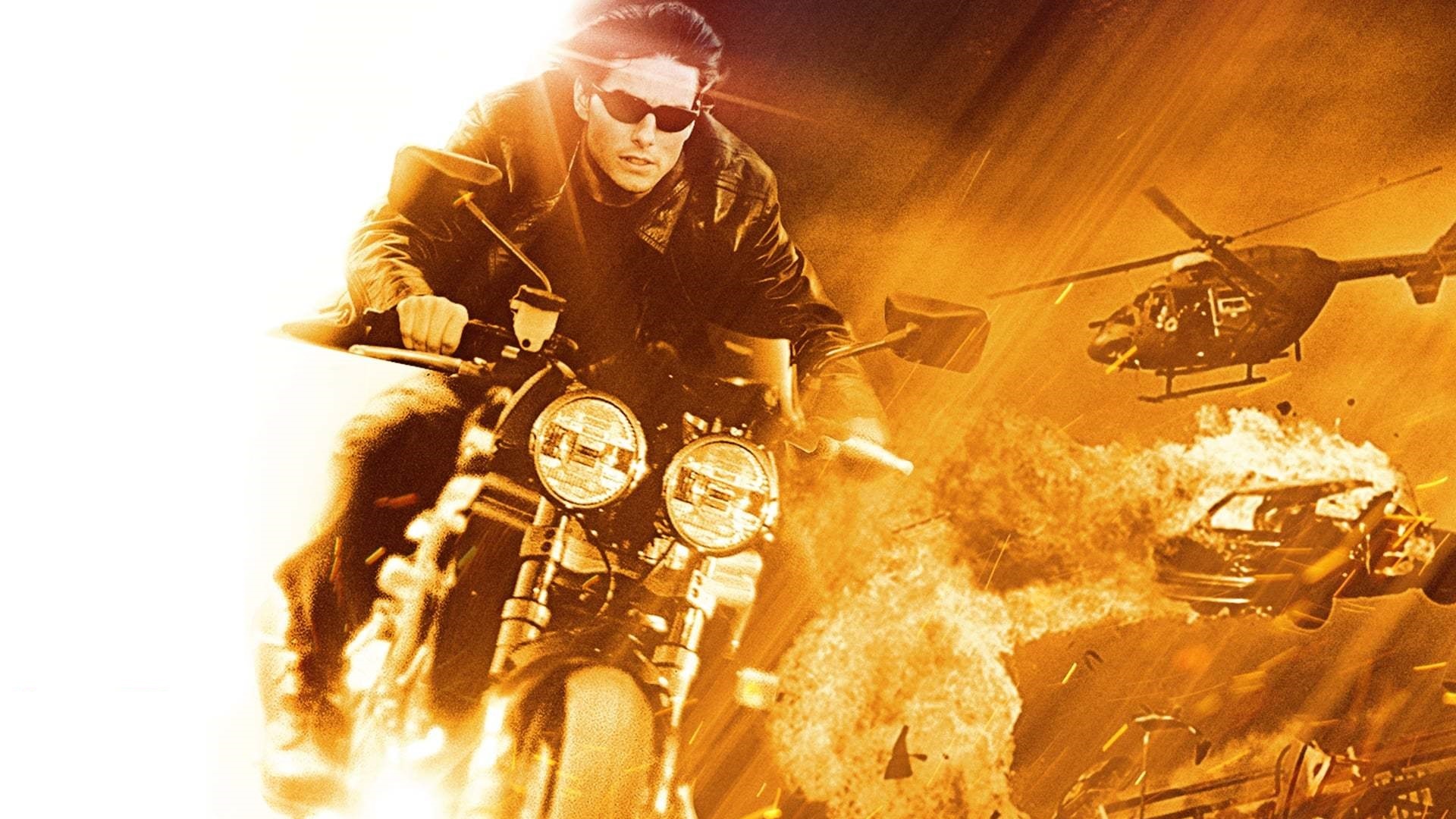Ethan Hunt from Mission: Impossible II on a motorcycle HD Wallpaper