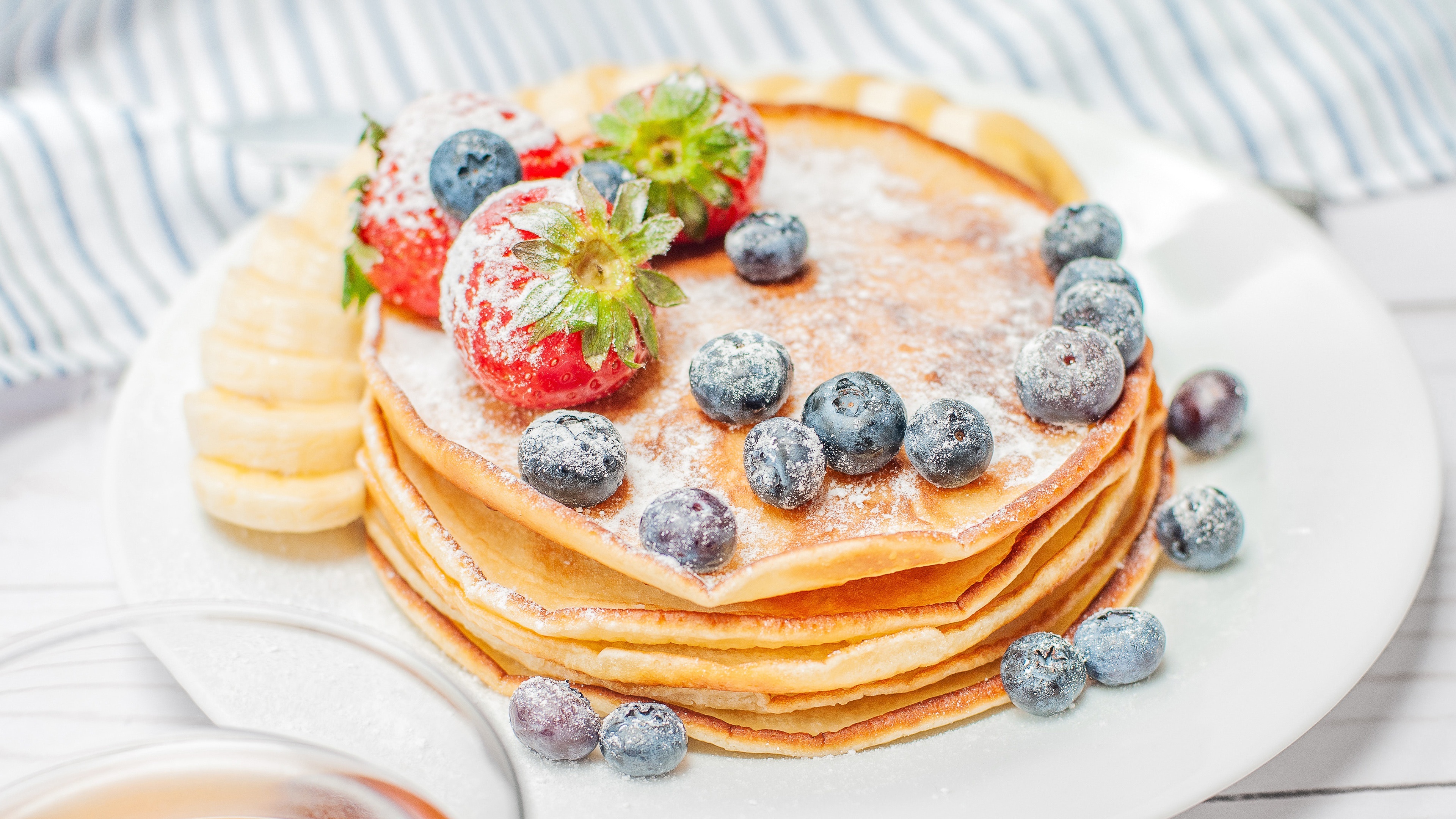 Stack of pancakes with strawberries and blueberries HD Wallpaper