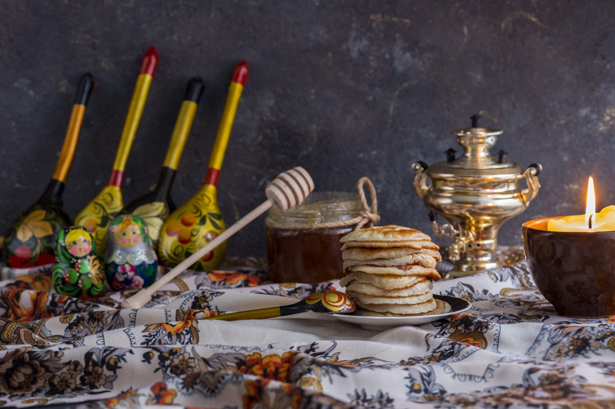 Still life with pancakes, honey, and Russian nesting dolls HD Wallpaper