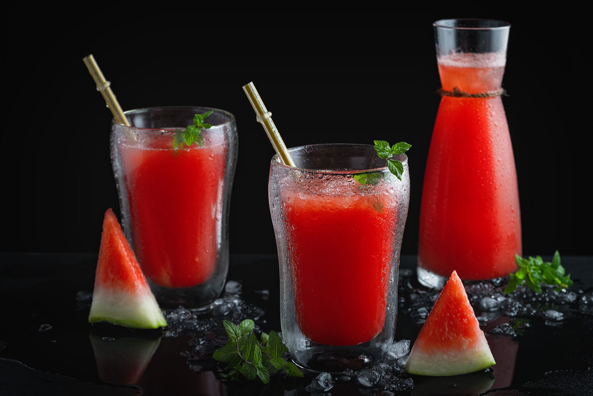Watermelon juice in glasses and carafe HD Wallpaper